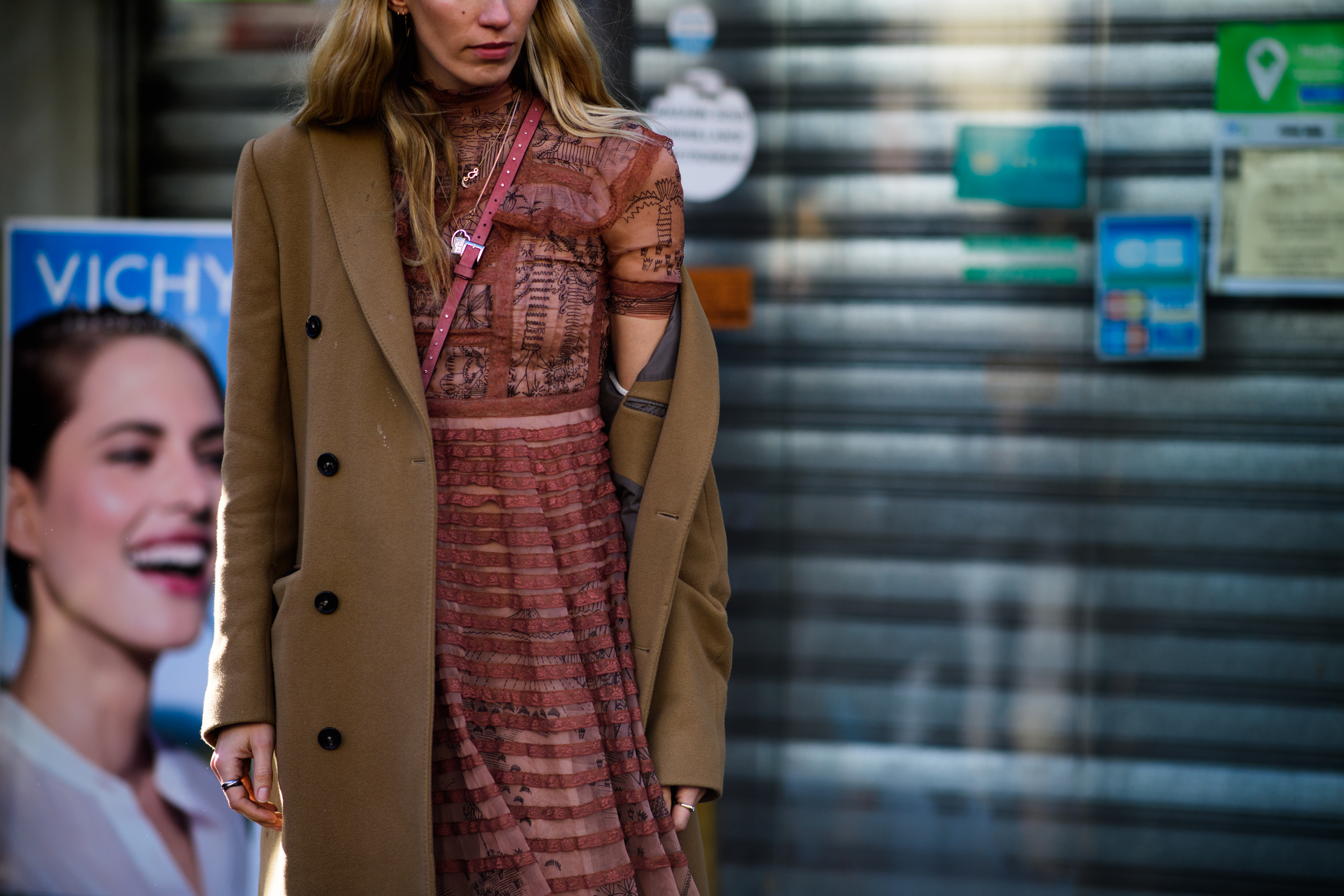German buyer wearing beige coat