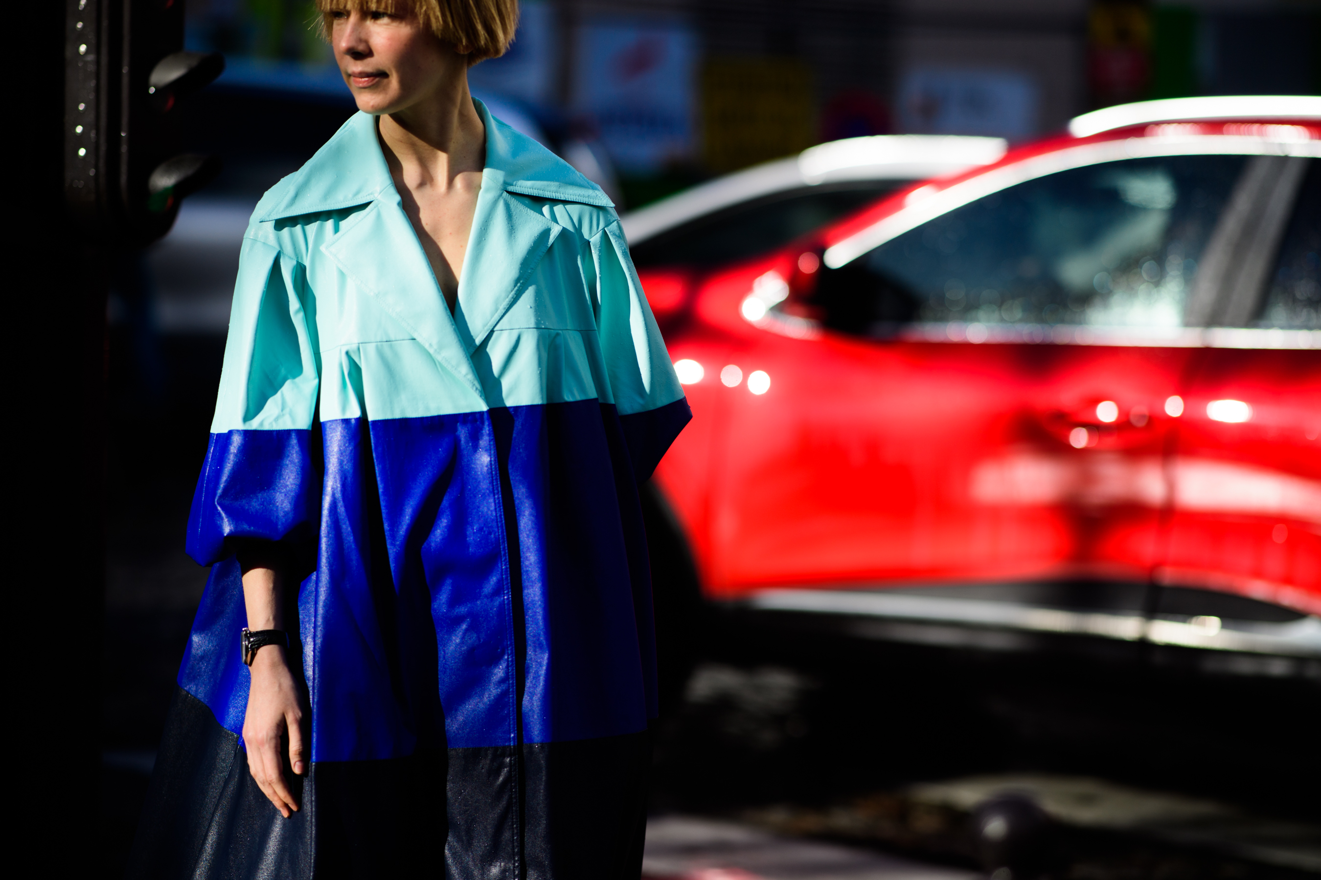 Russian designer wearing blue coat