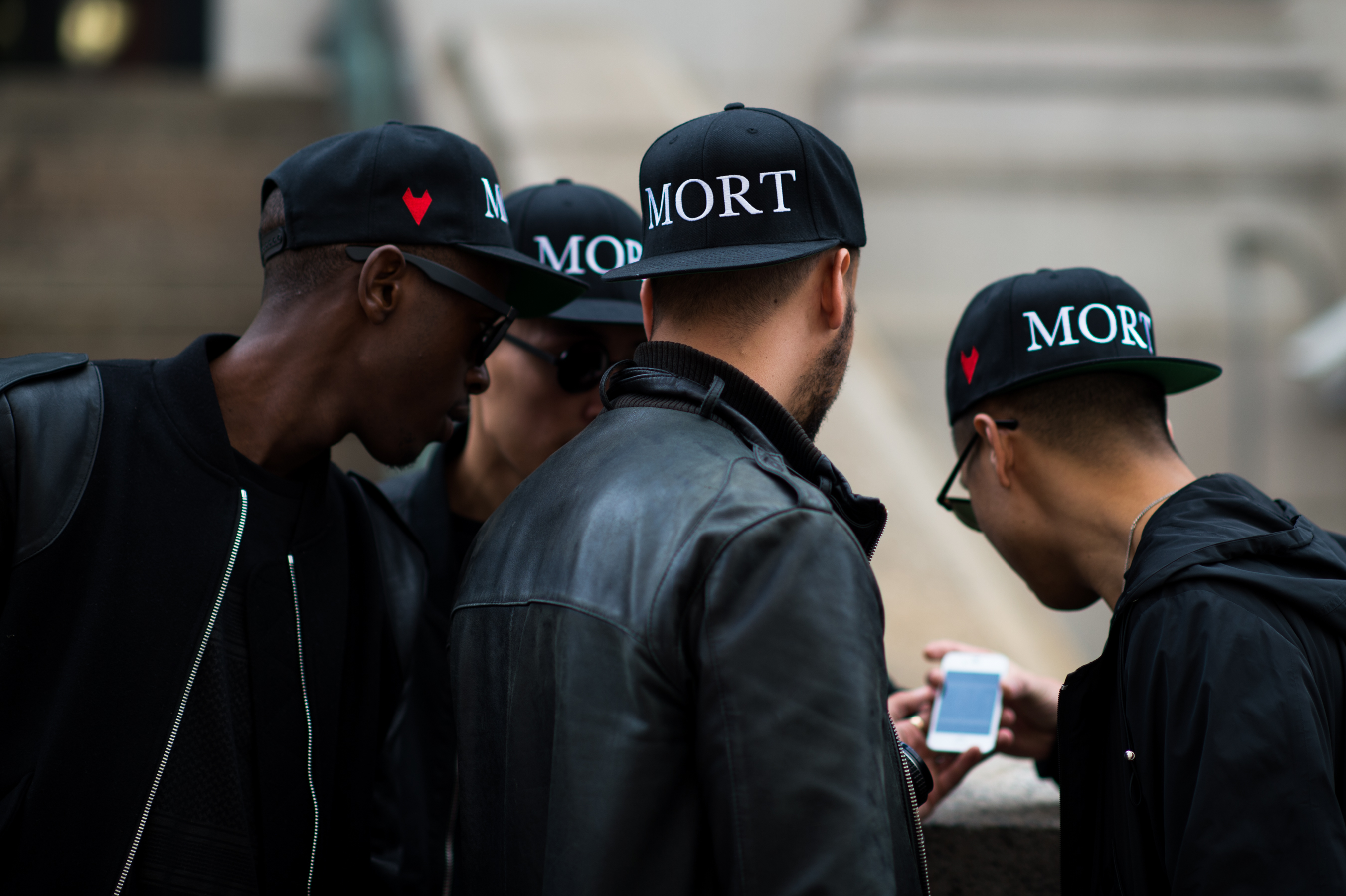 Group of men wearing Mort hats