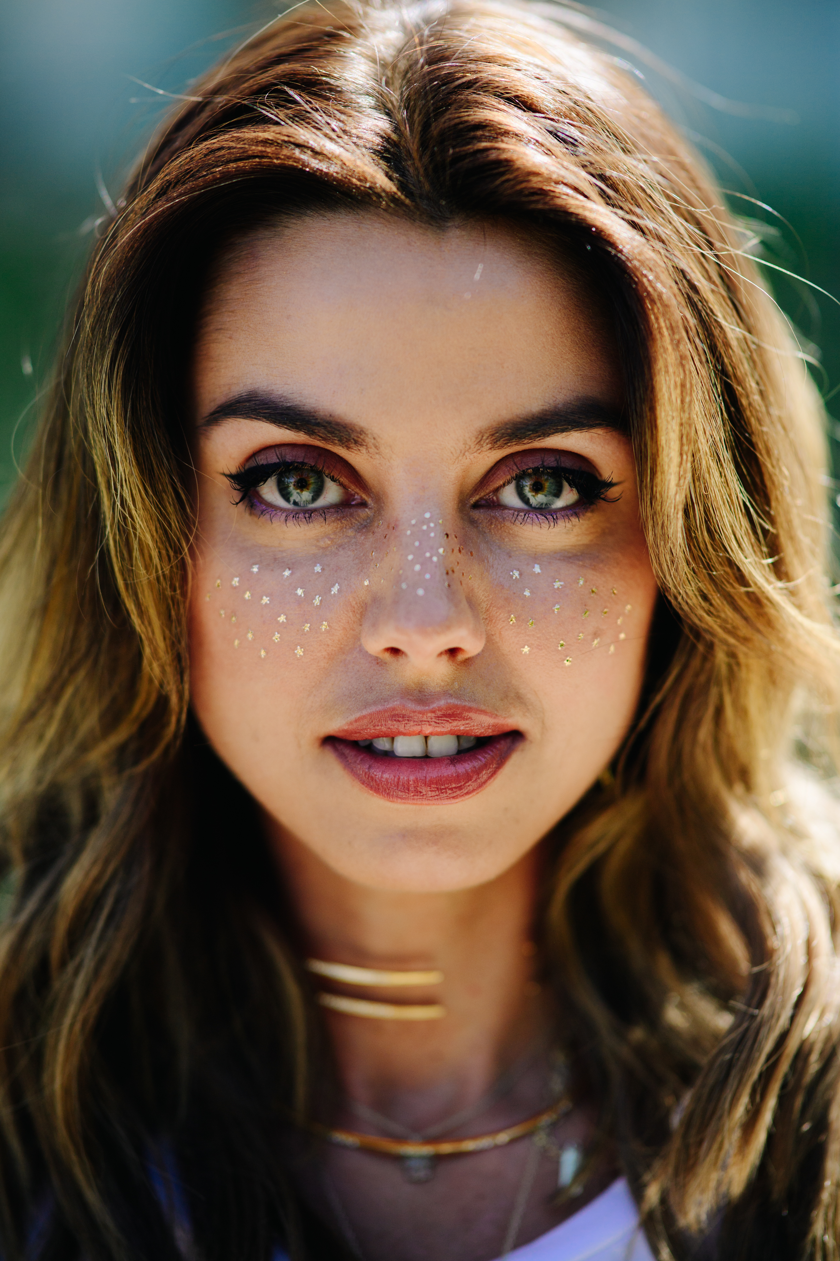 Portrait of a blogger with shiny make up
