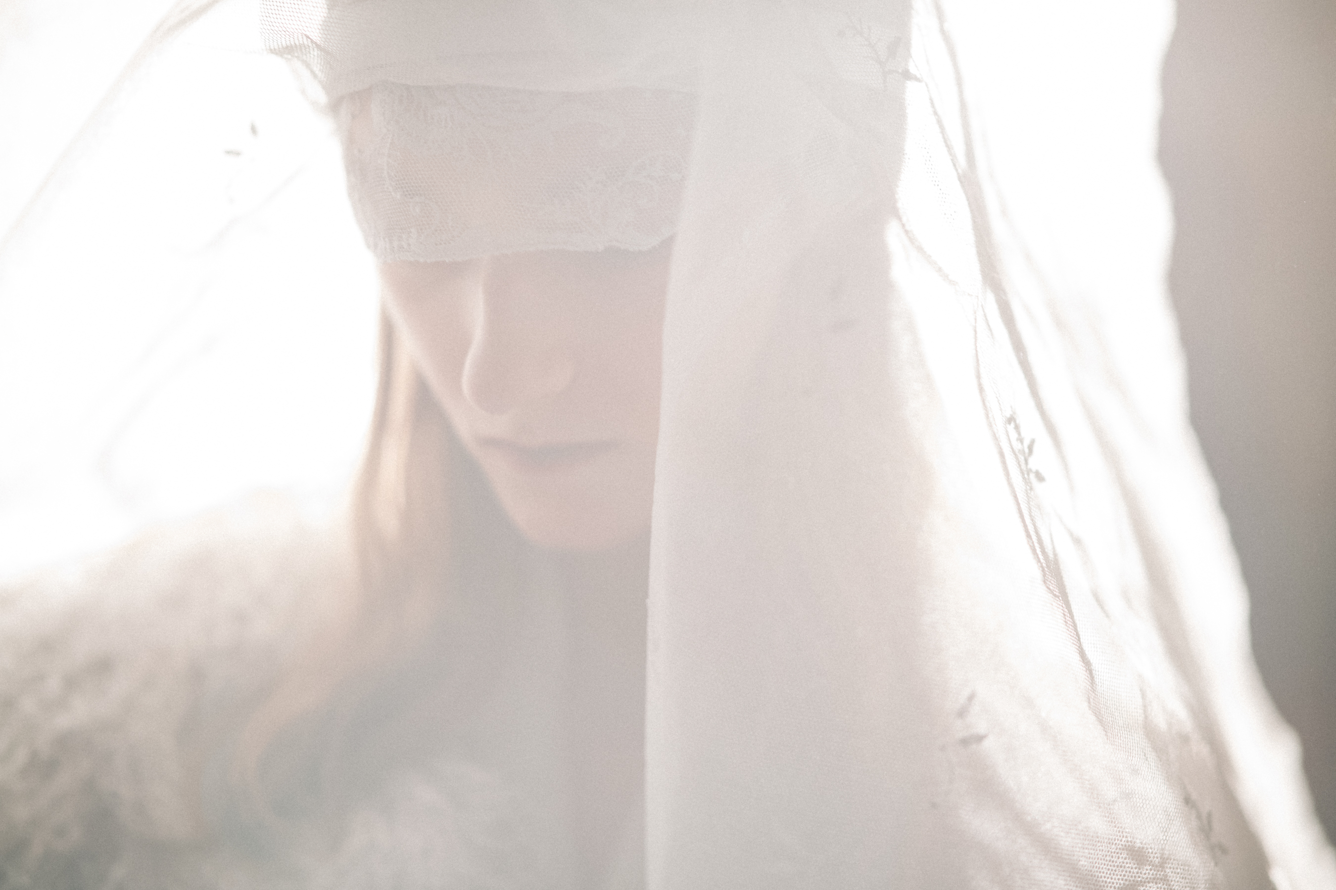Model Kasia Jujeczka wearing veil