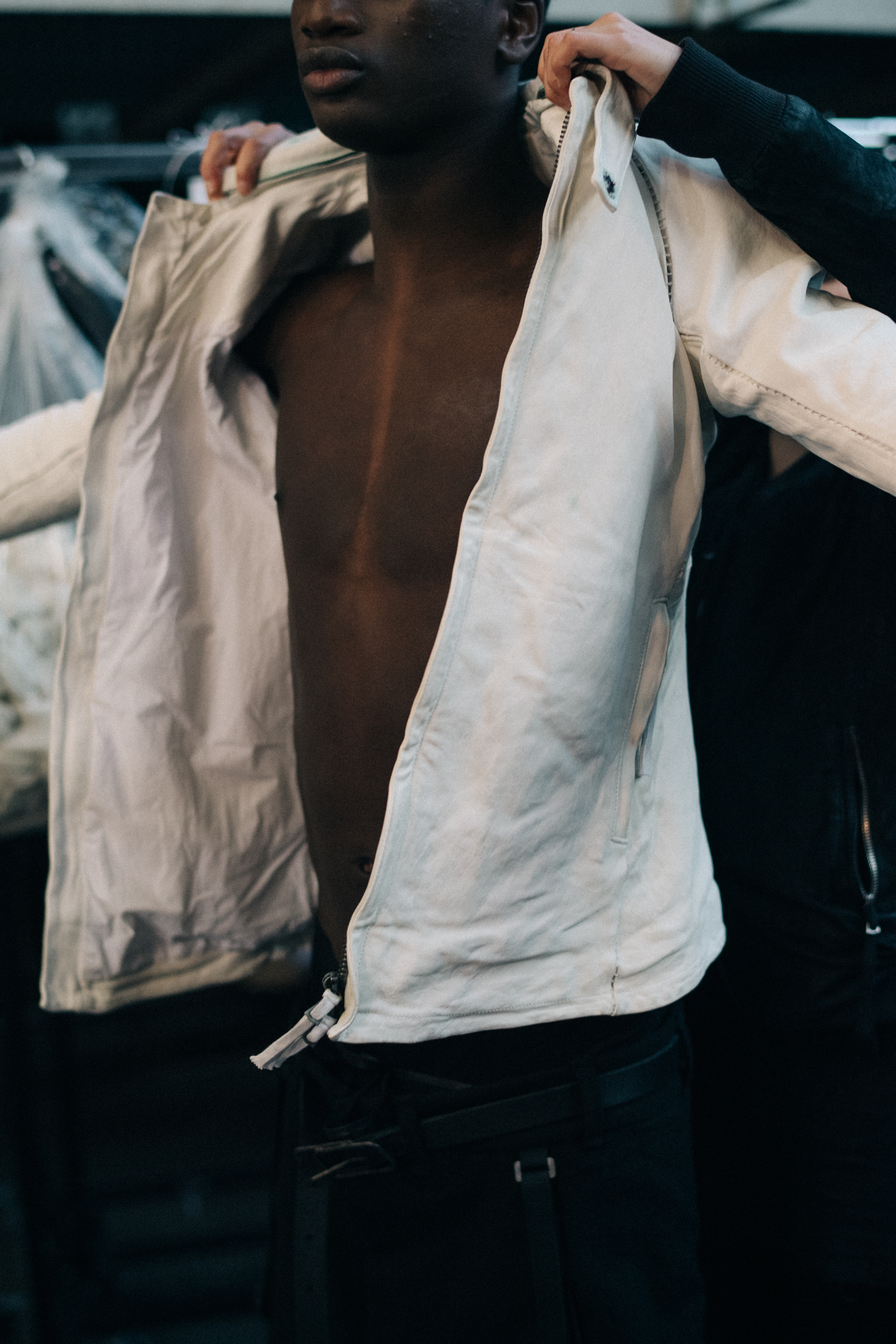 Male model wearing white jacket