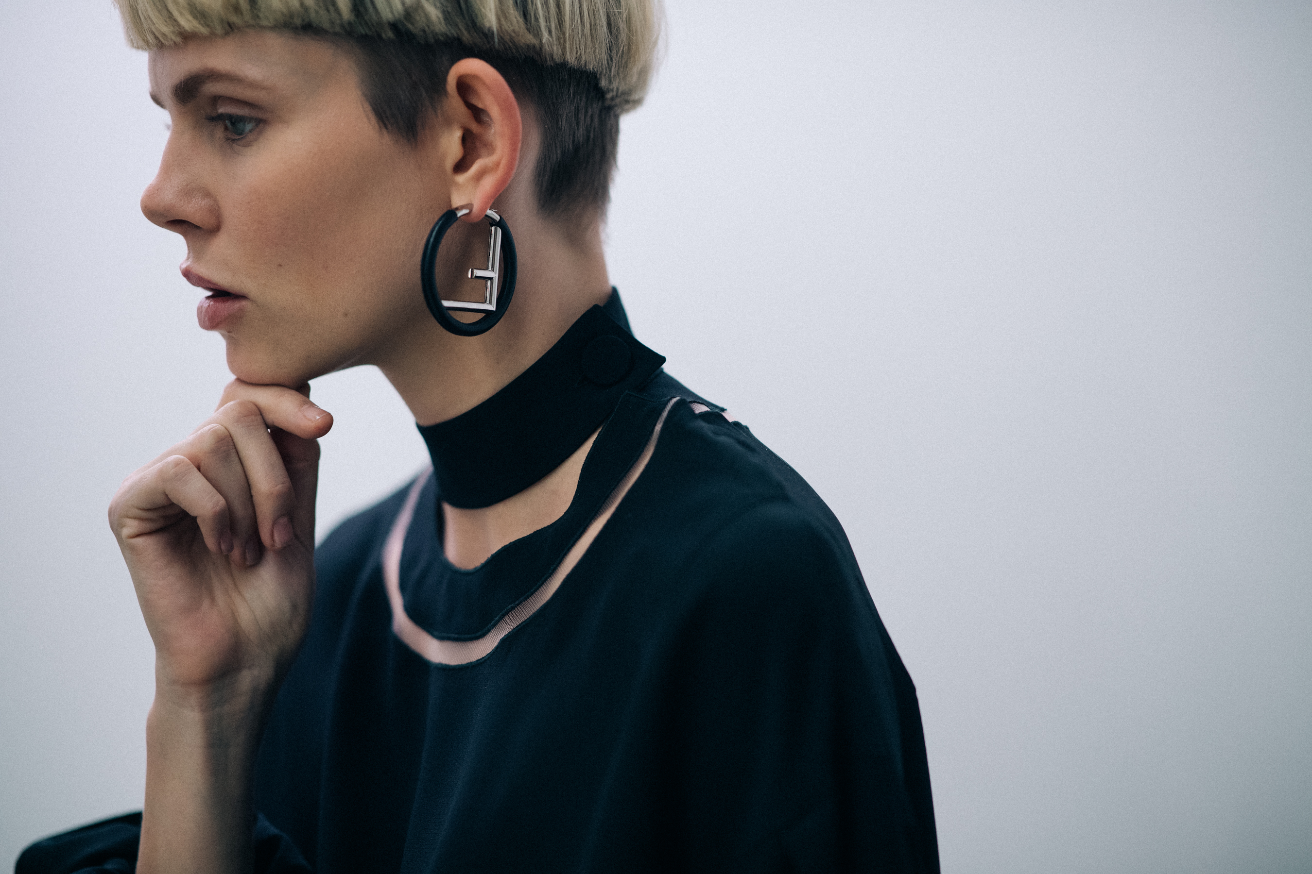 Model Nina Milner wearing earrings