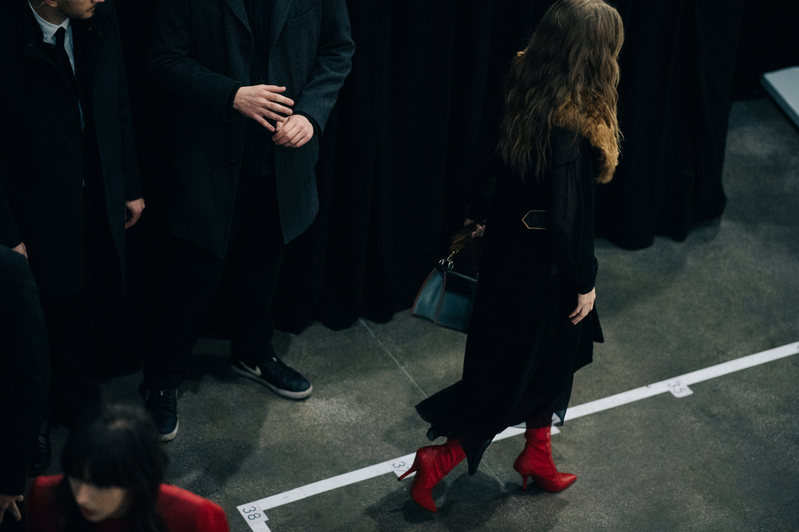 Gigi Hadid wearing red boots