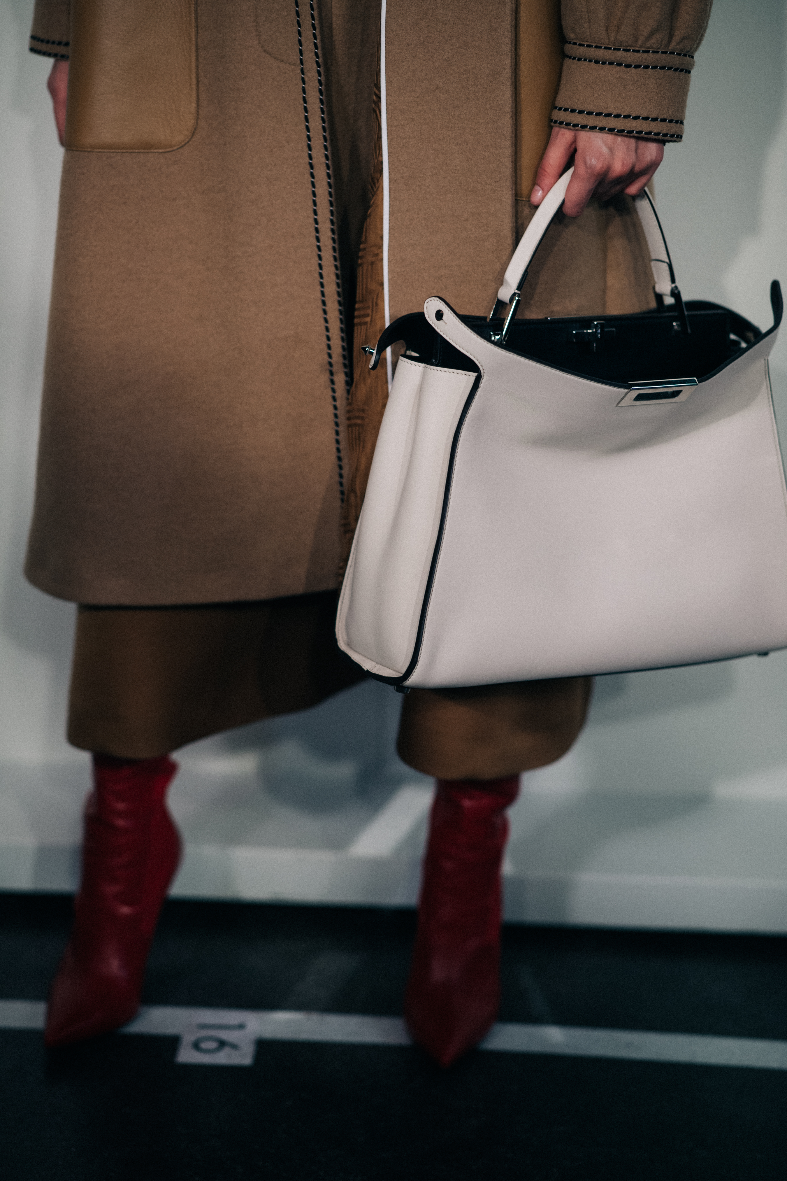 Model Nora Attal wearing coat