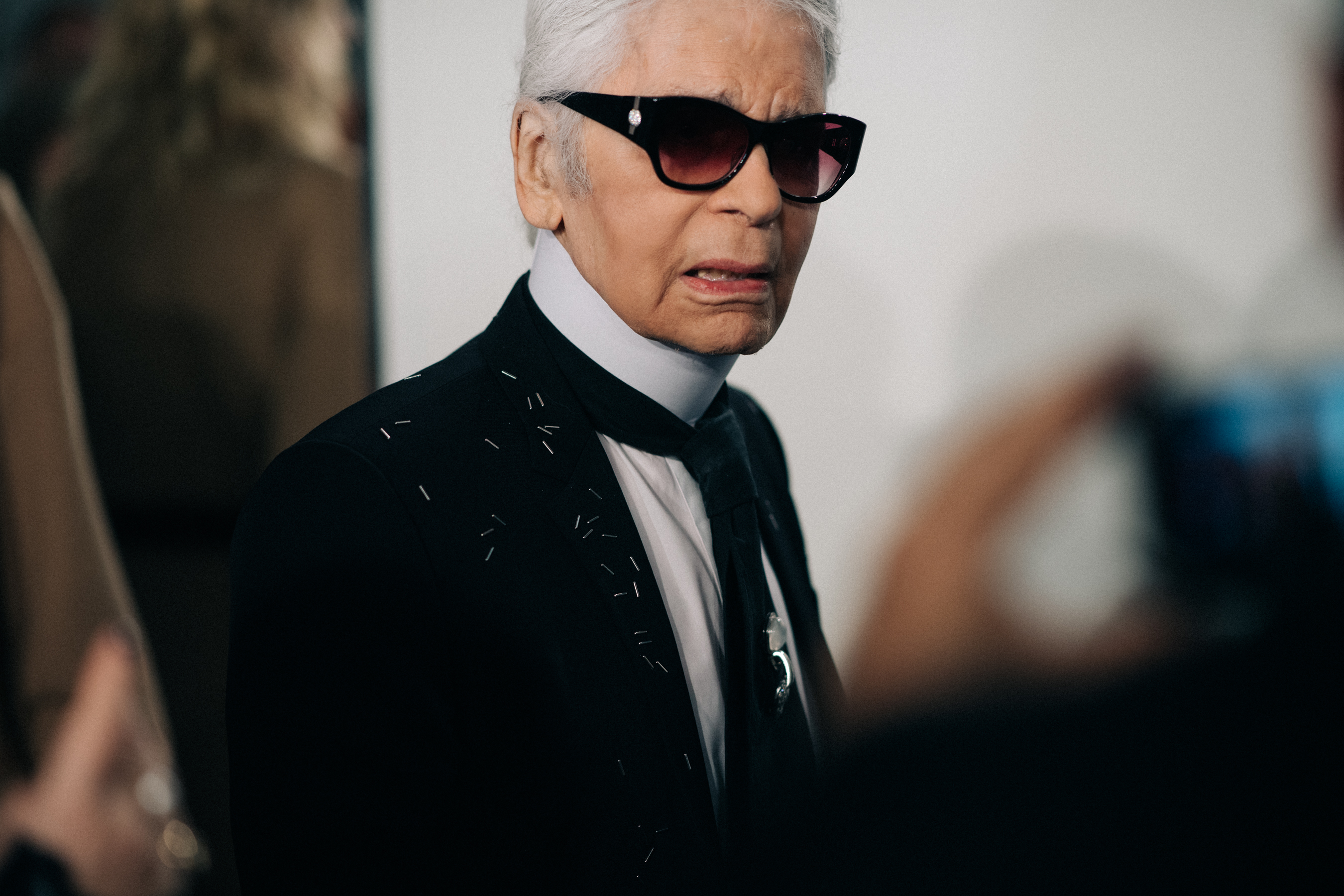 Karl Lagerfeld wearing glasses