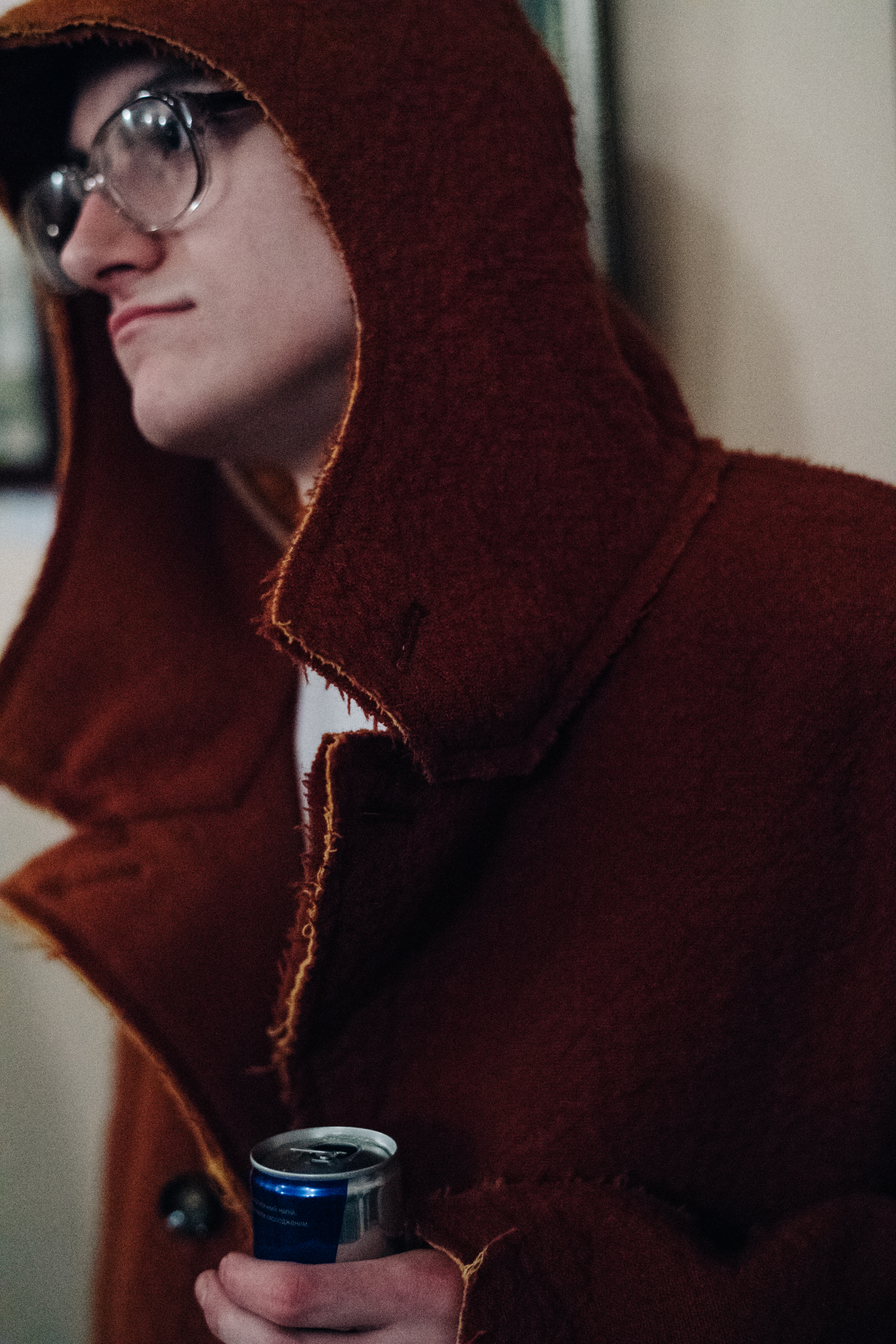 Male model wearing orange coat