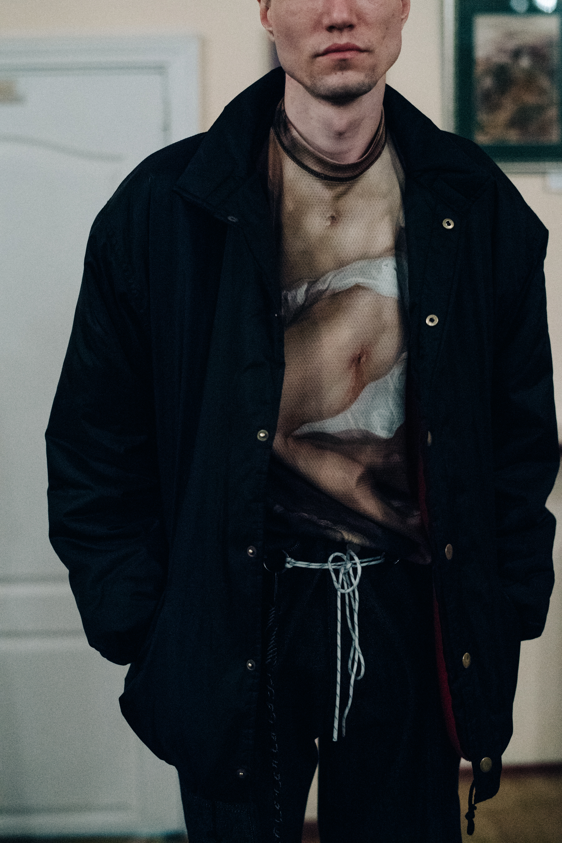 Male model wearing black jacket