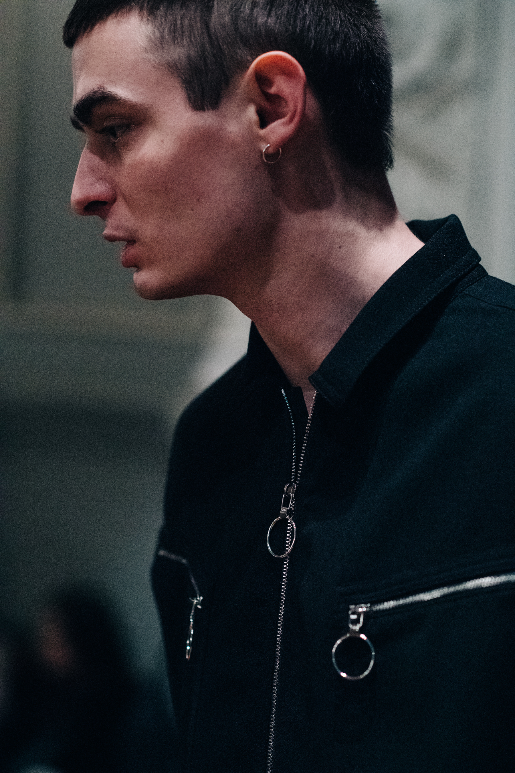 Male model wearing black outfit