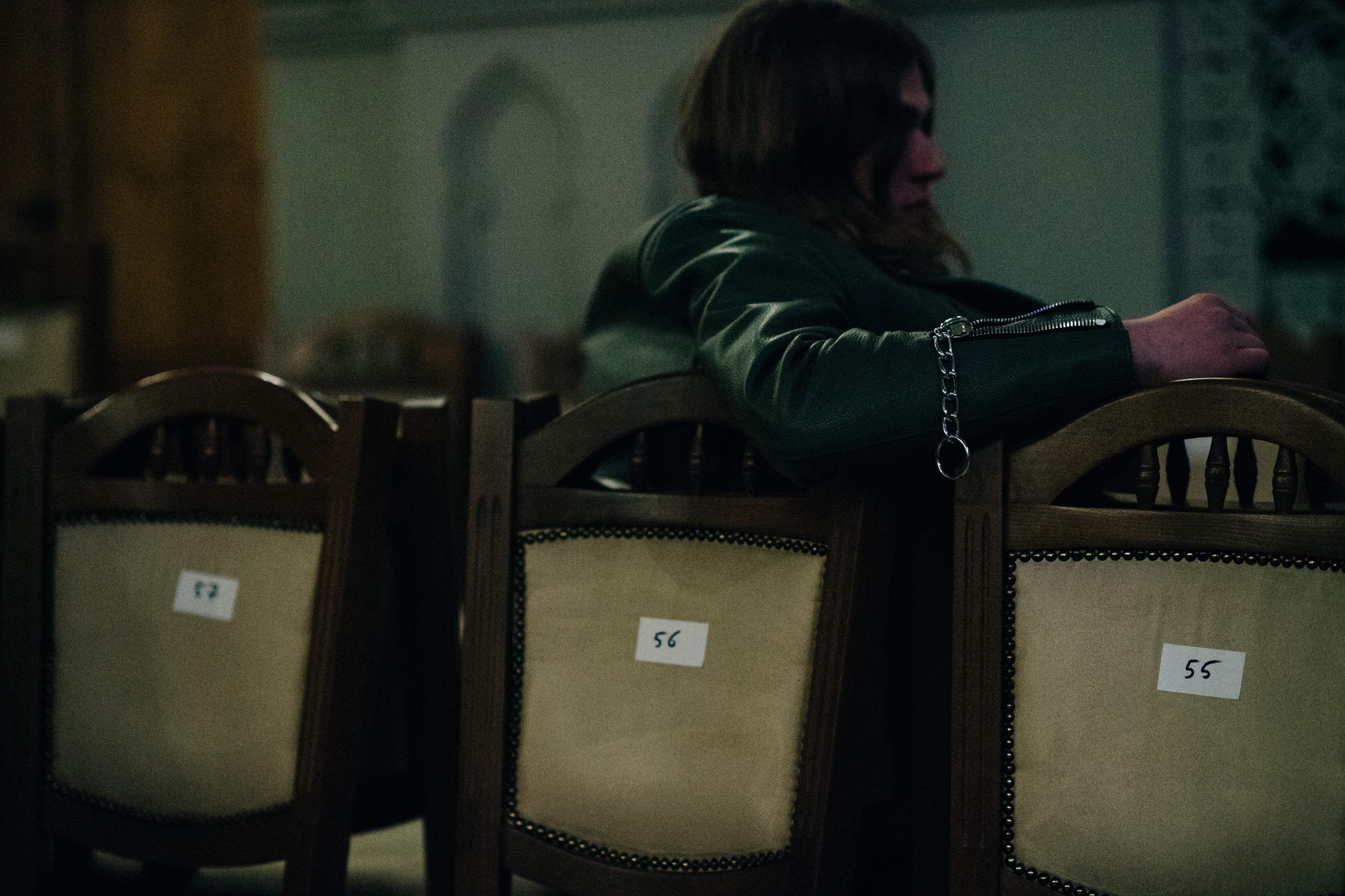 Male model wearing green leather jacket