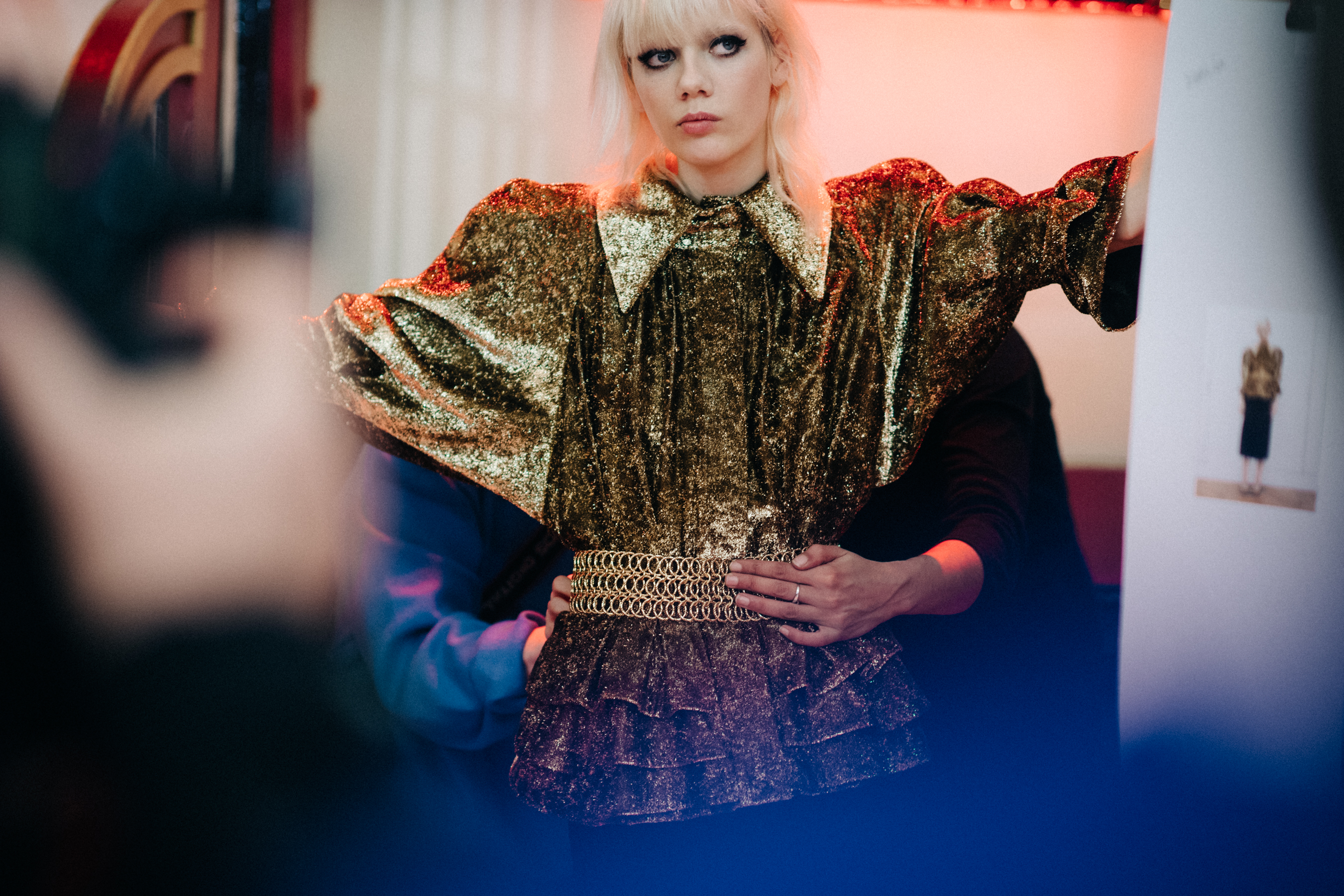 Model Marjan Jonkman wearing golden top