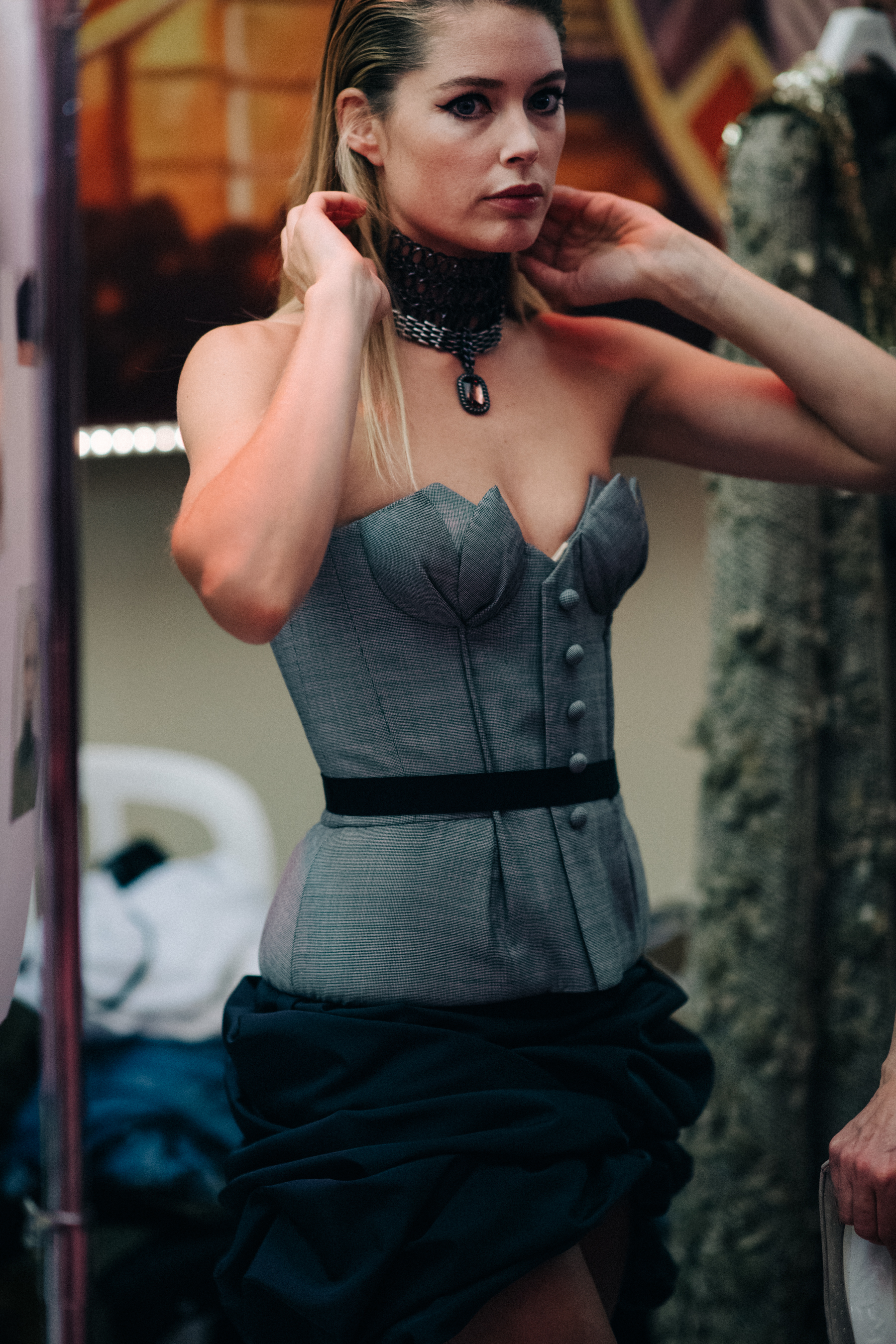 Model Doutzen Kroes wearing grey corset