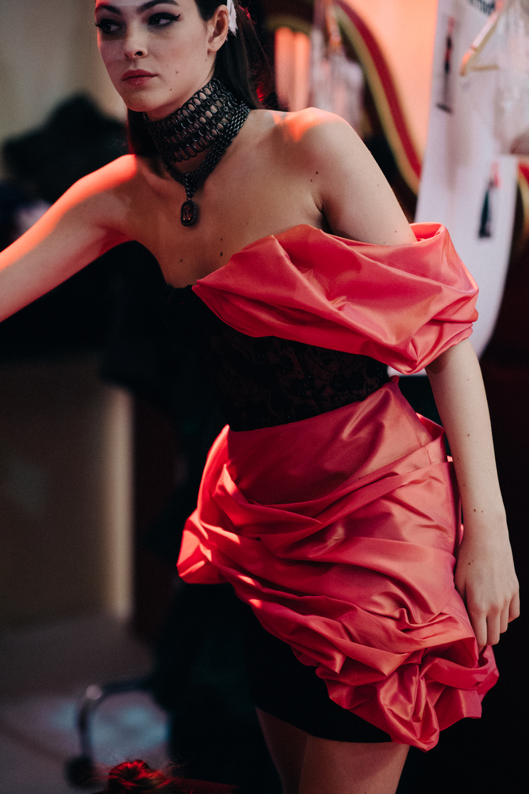 Model Vittoria Ceretti wearing red dress
