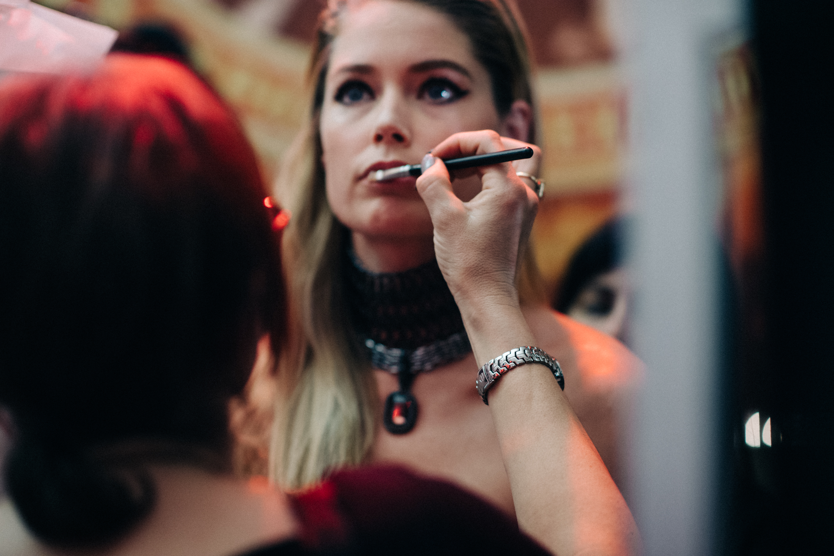 Model Doutzen Kroes getting make up