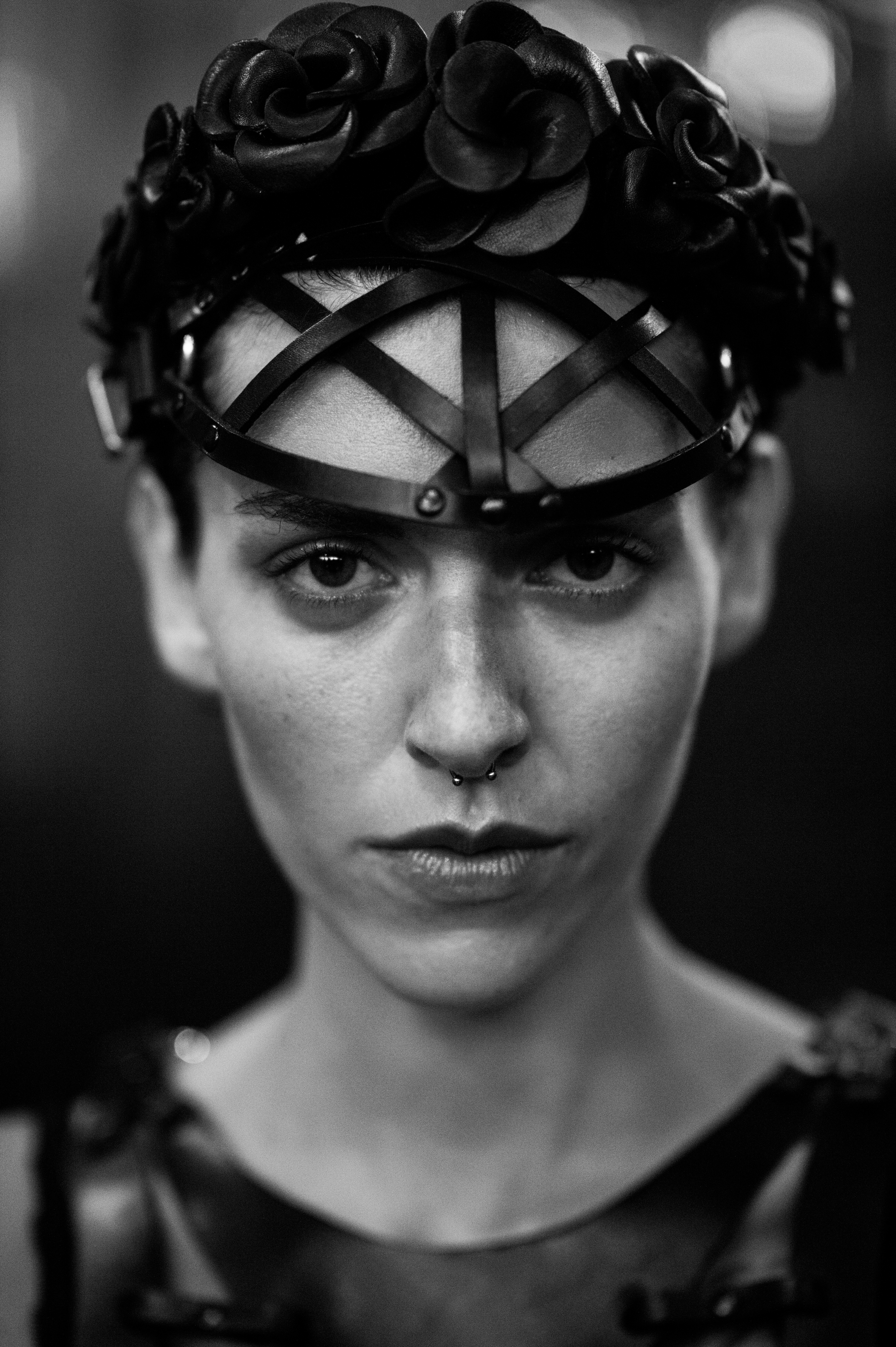 Model wearing leather mask
