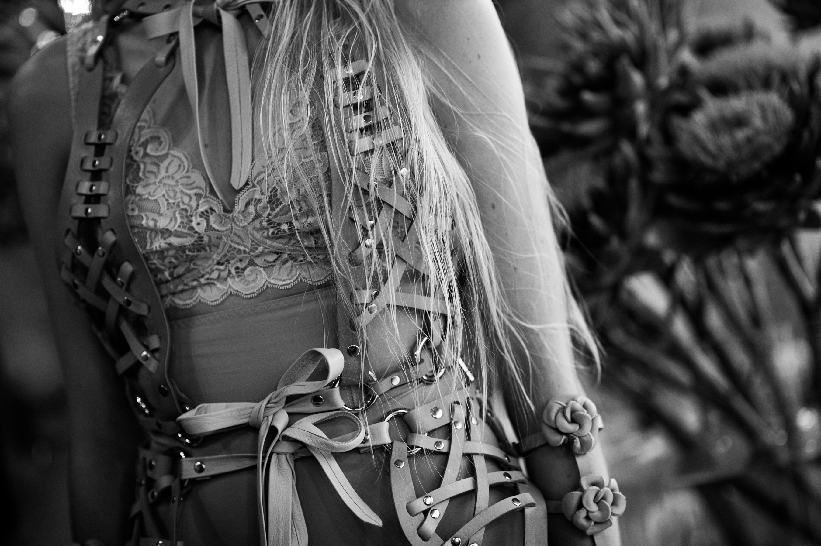 Model wearing leather corset