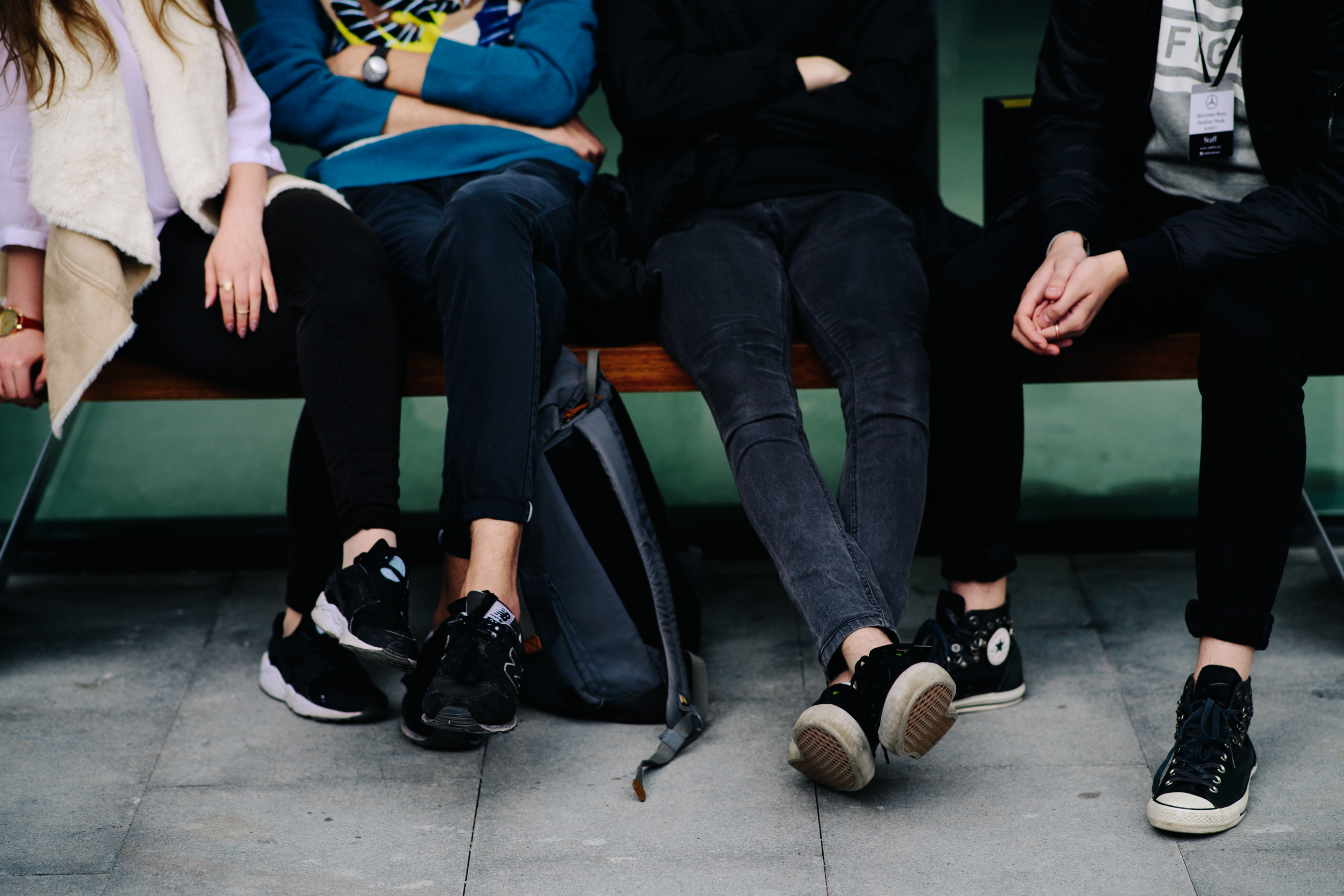 Group of people wearing sneakers