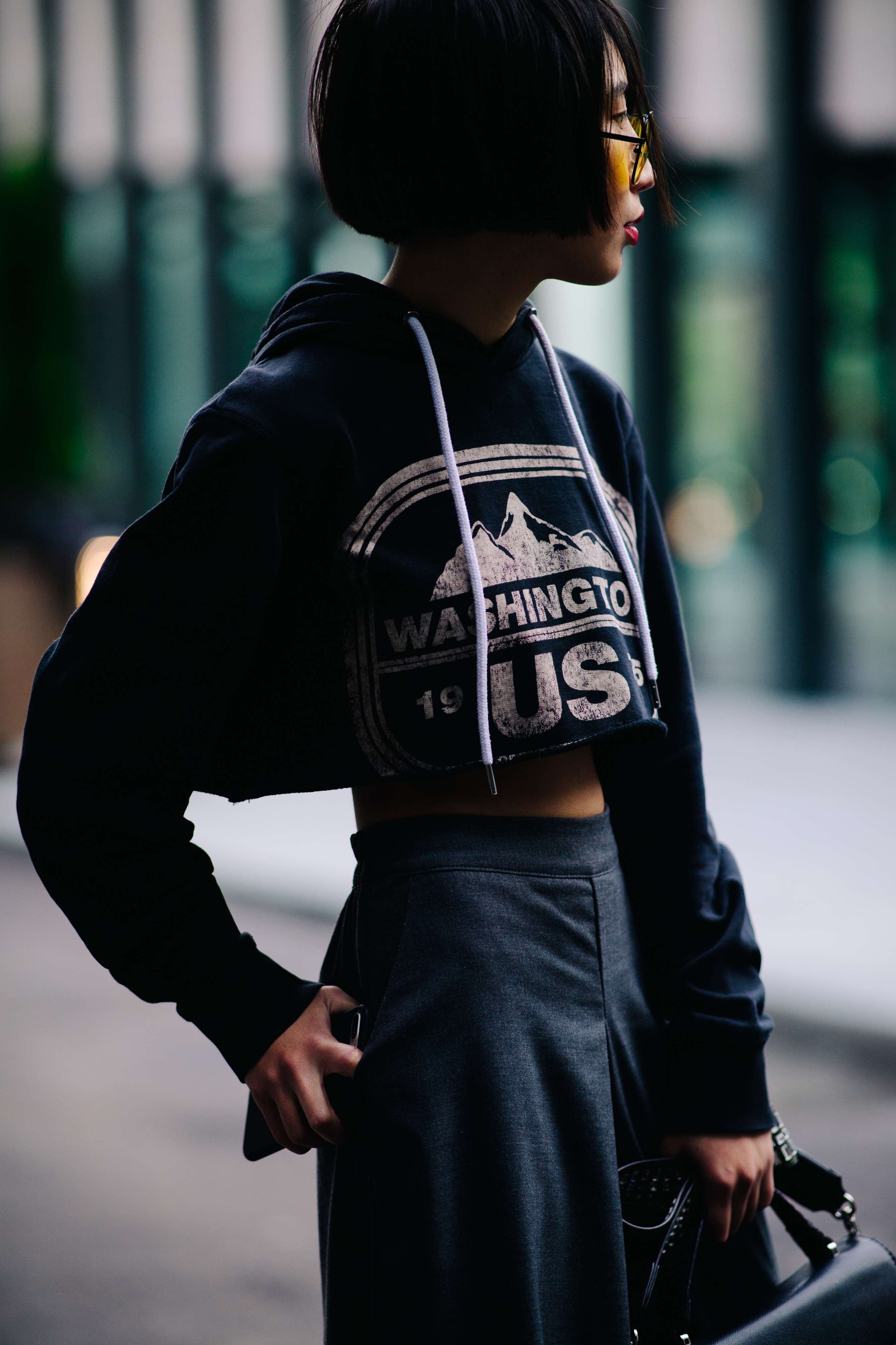 Woman wearing cropped hoodie