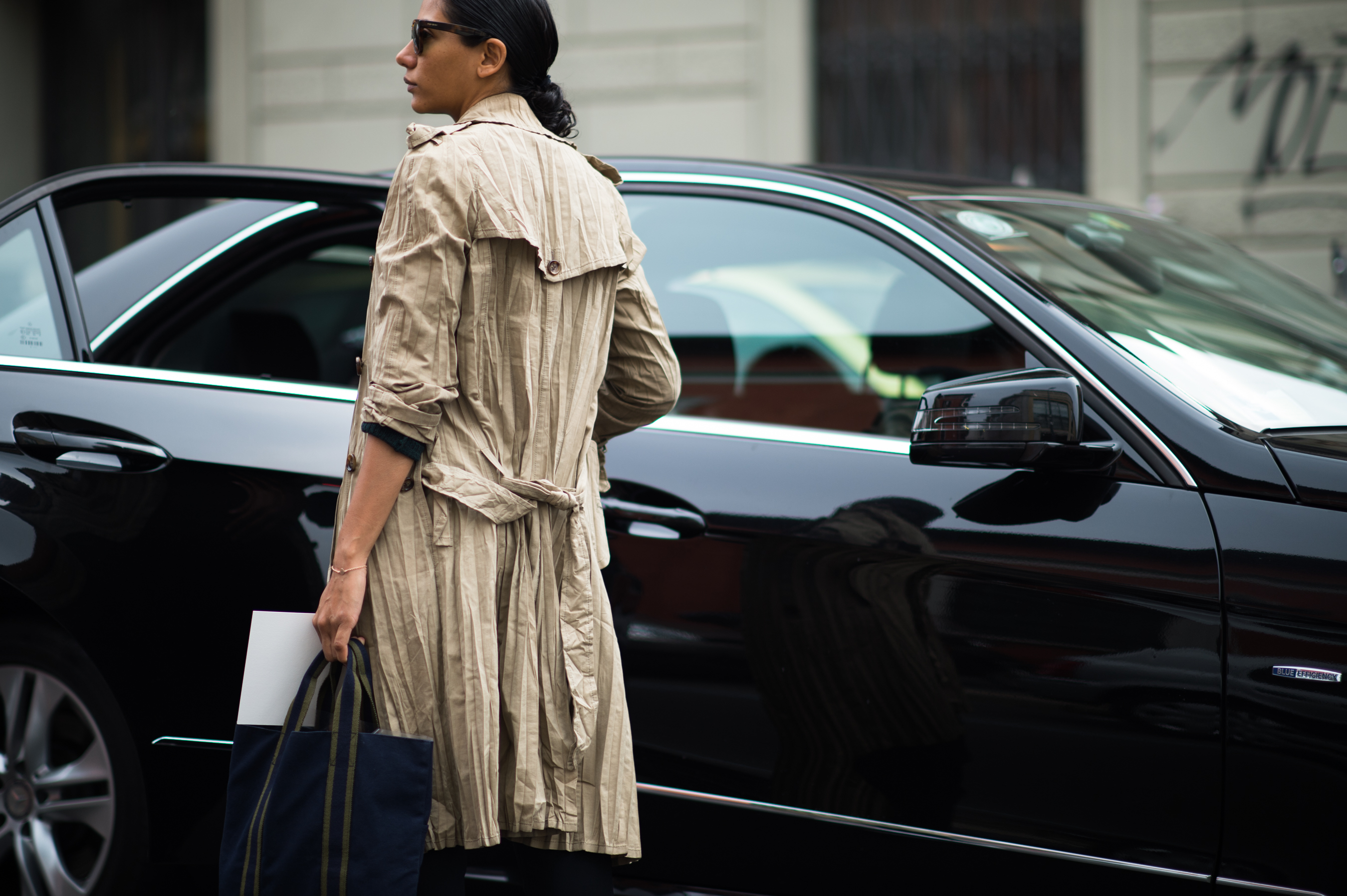 Woman wearing beige trench coat