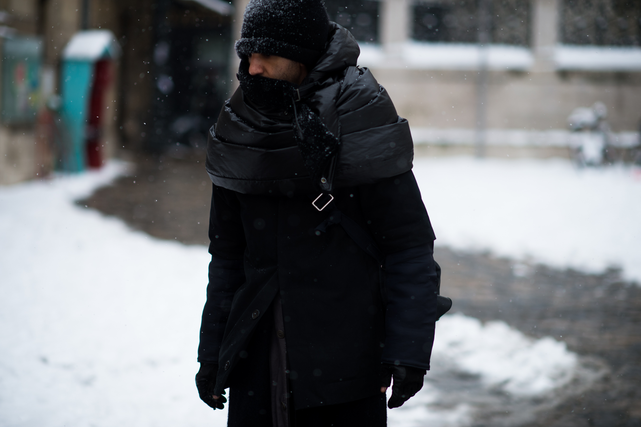 Man wearing black coat
