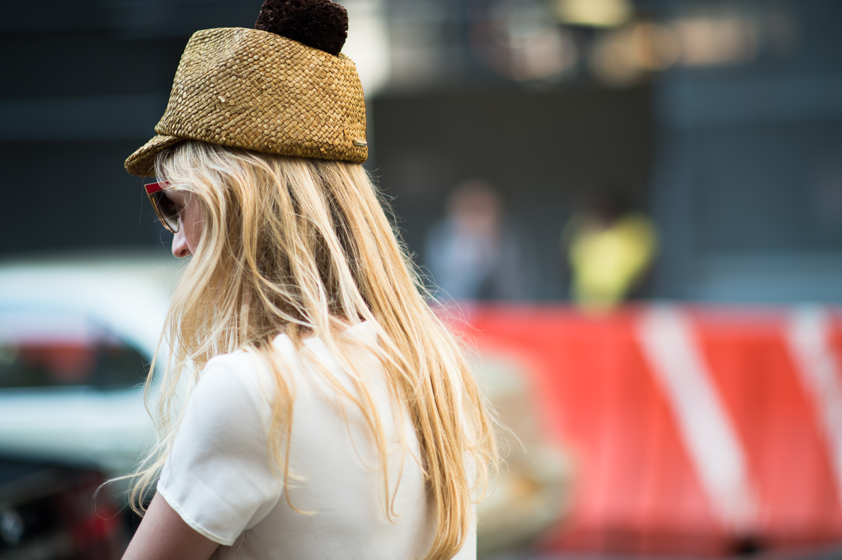 Woman wearing woven hat