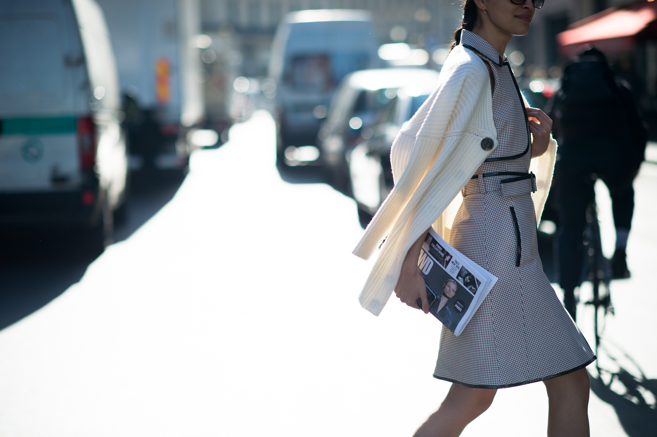 Editor wearing white dress