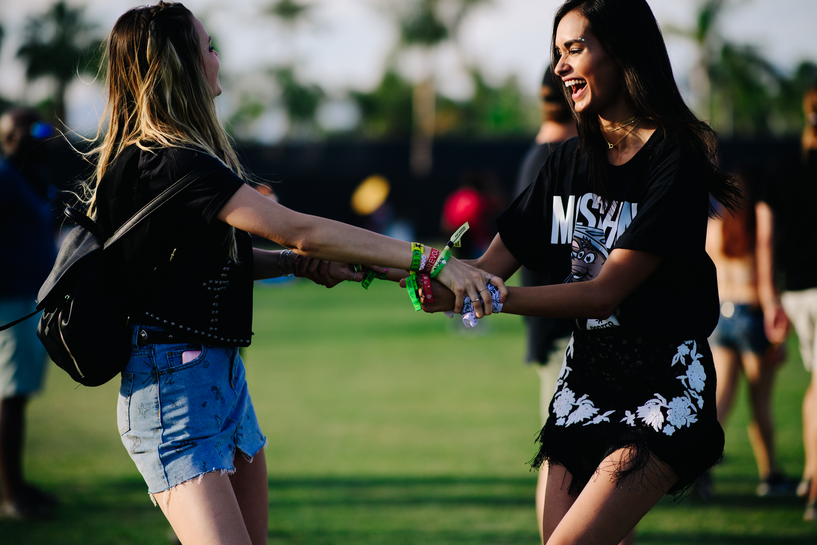 Two models dancing at festival