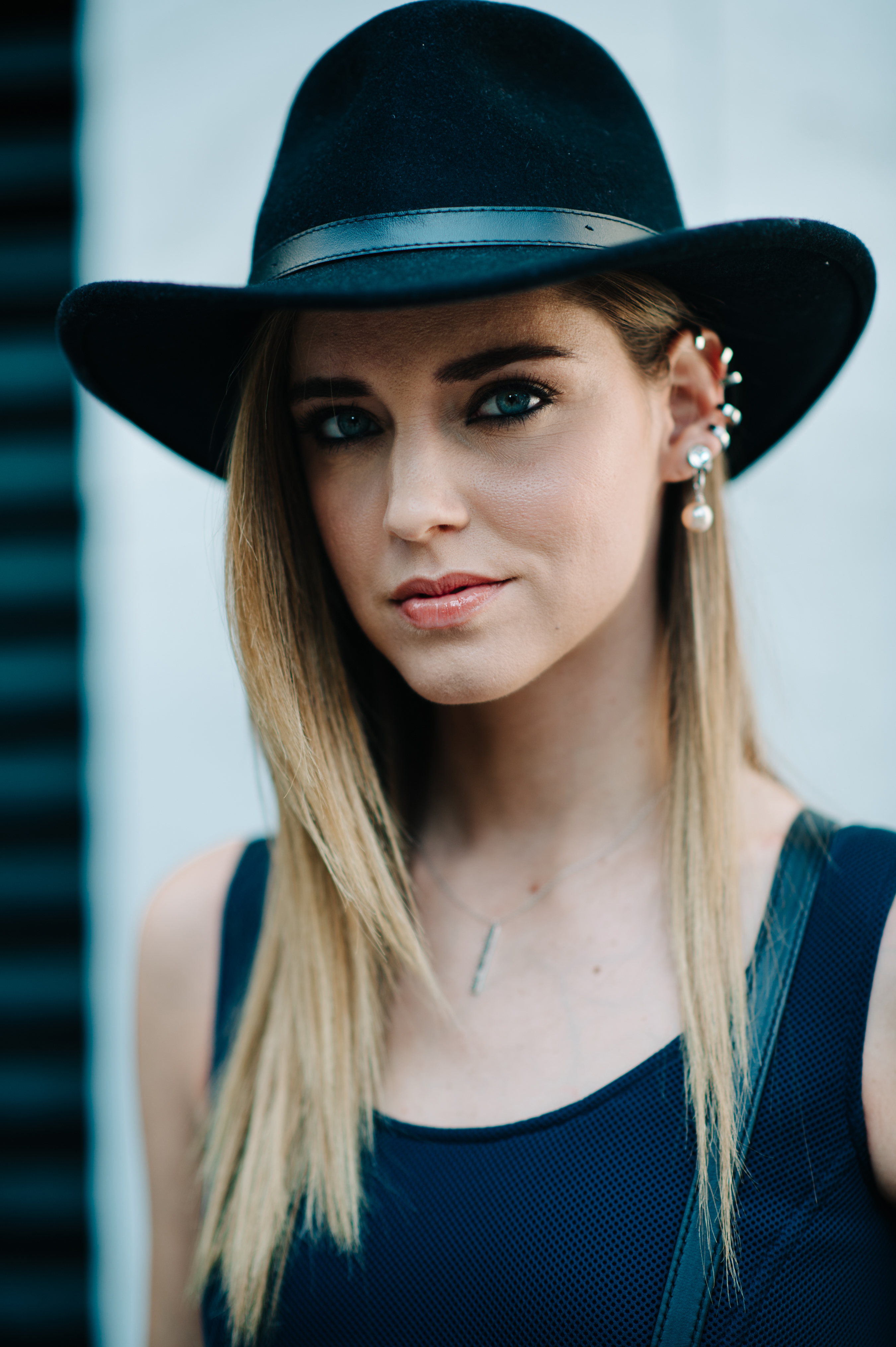 Portrait of a blogger wearing hat