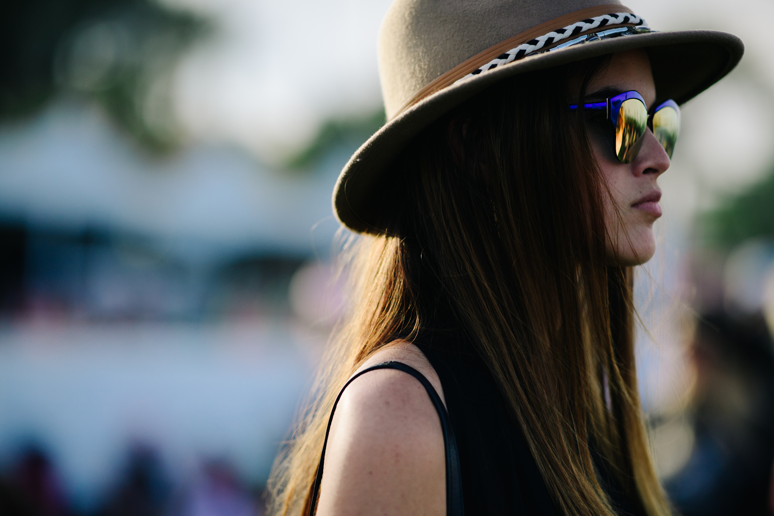Girl wearing hat and sunglasses