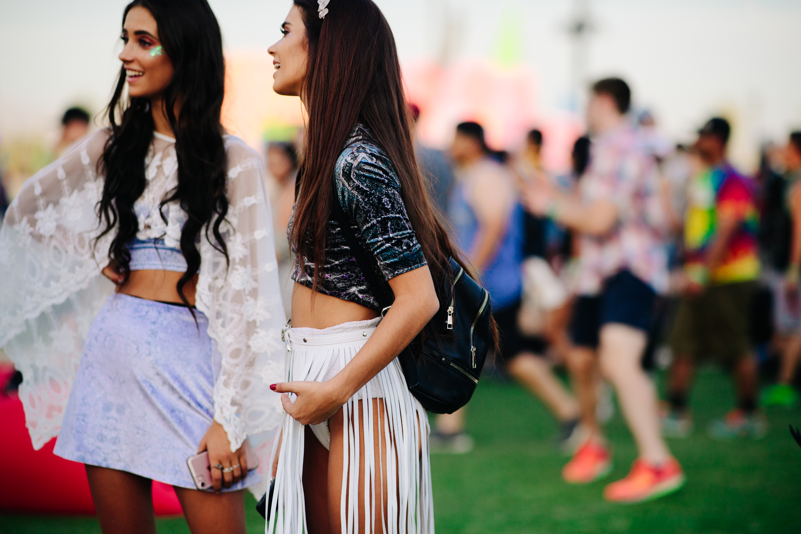 Two girls wearing mini skirts