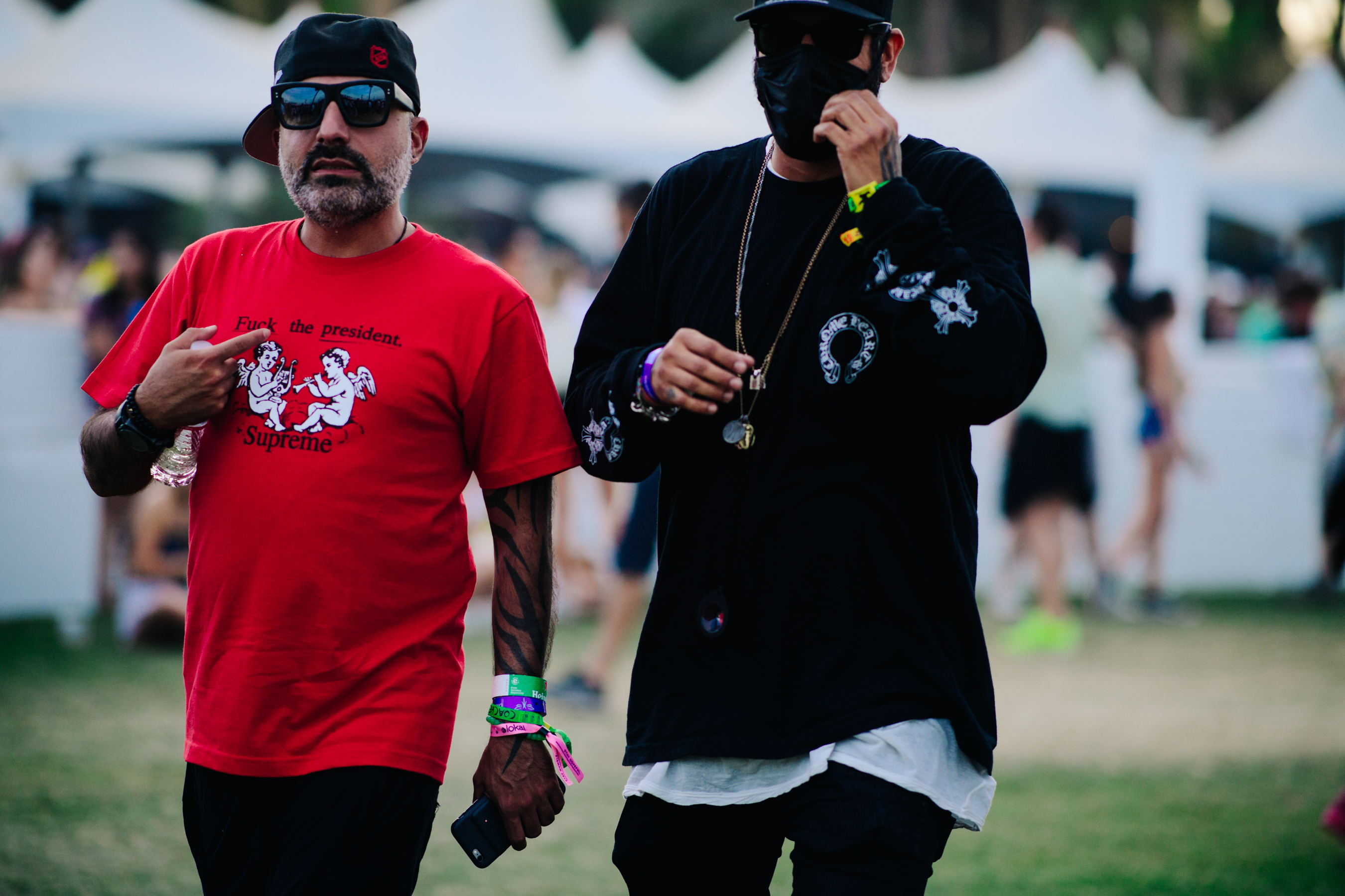 Two men wearing Supreme