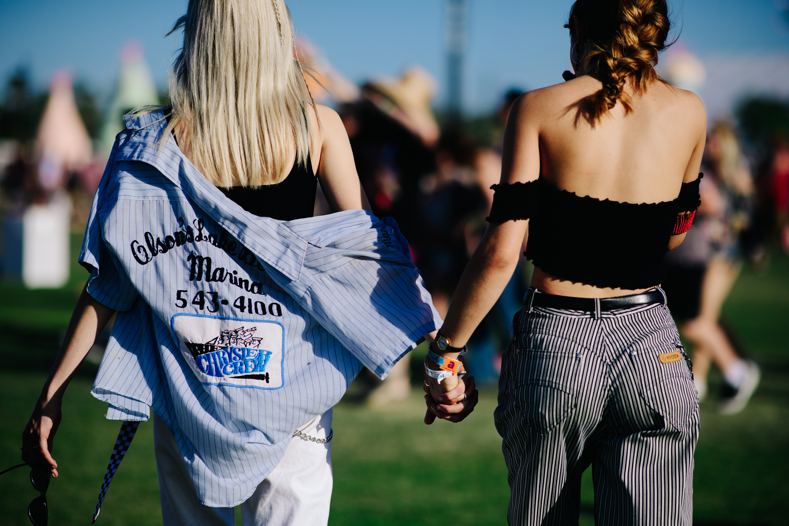 Two girls holding hands