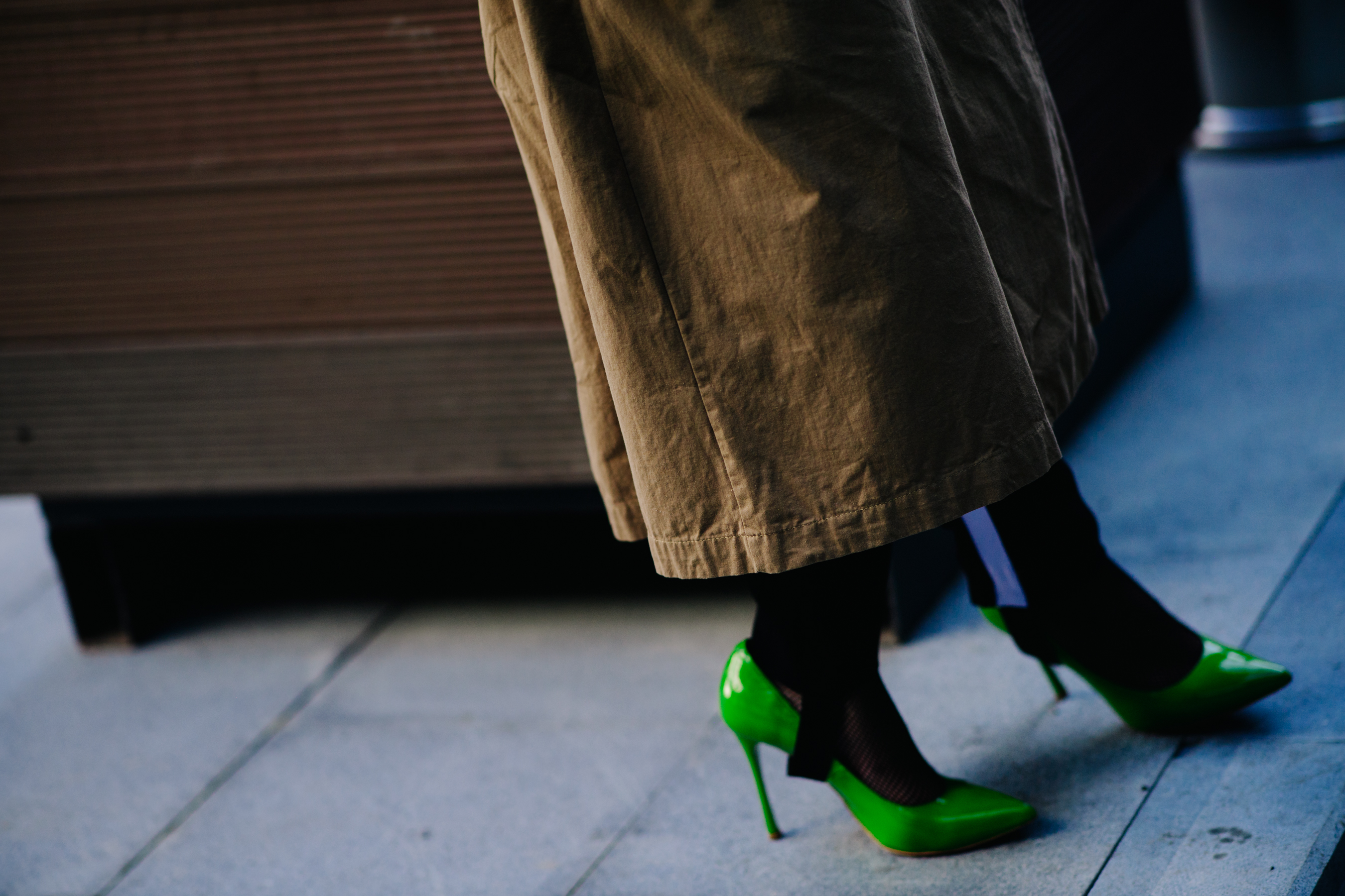 Woman wearing green shoes