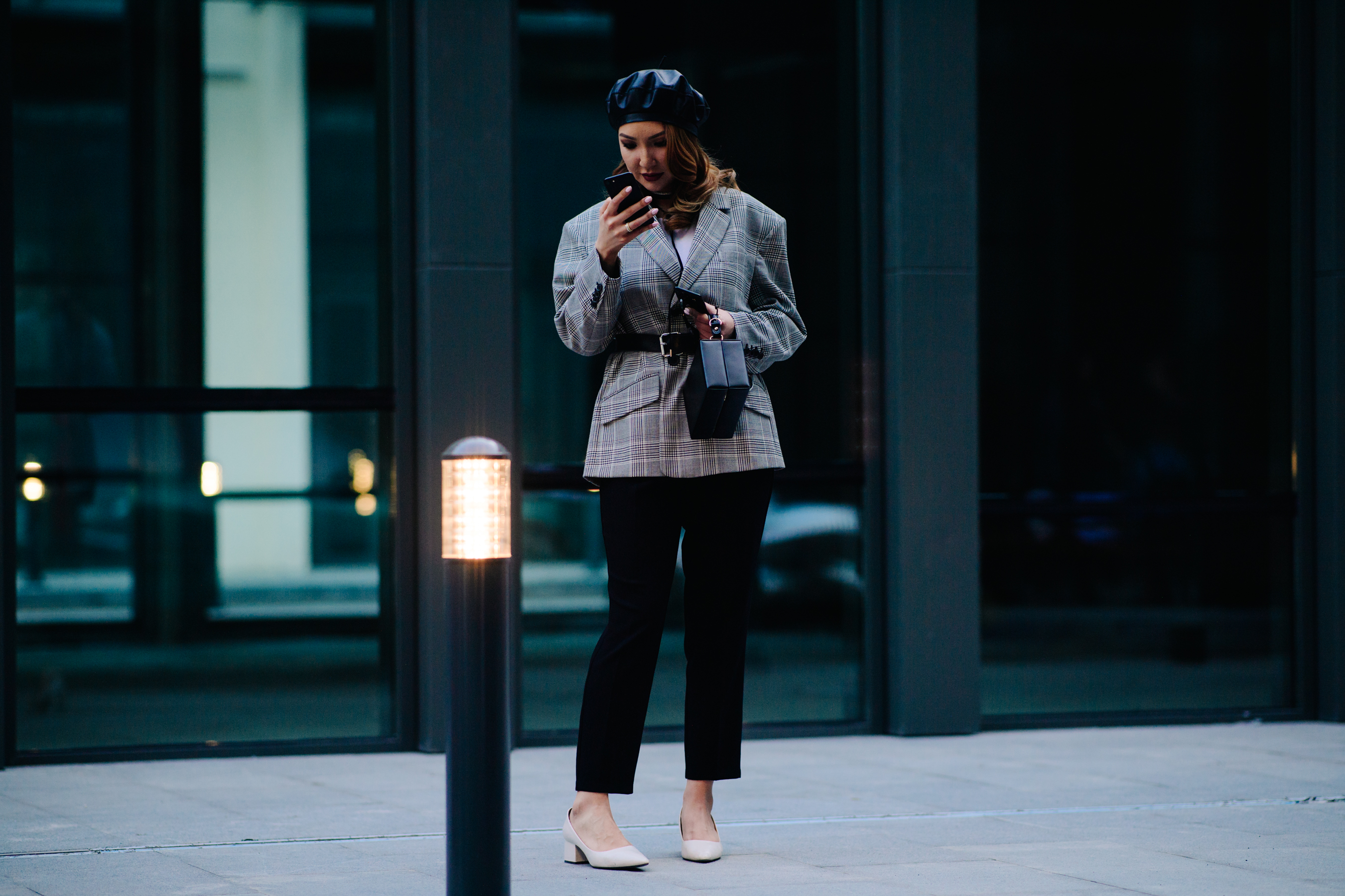 Woman wearing black beret and blazer