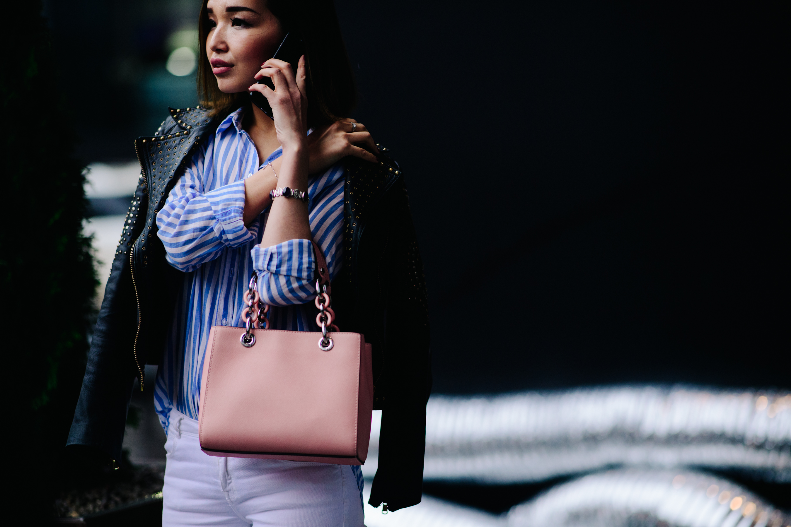 Woman with pink handbag