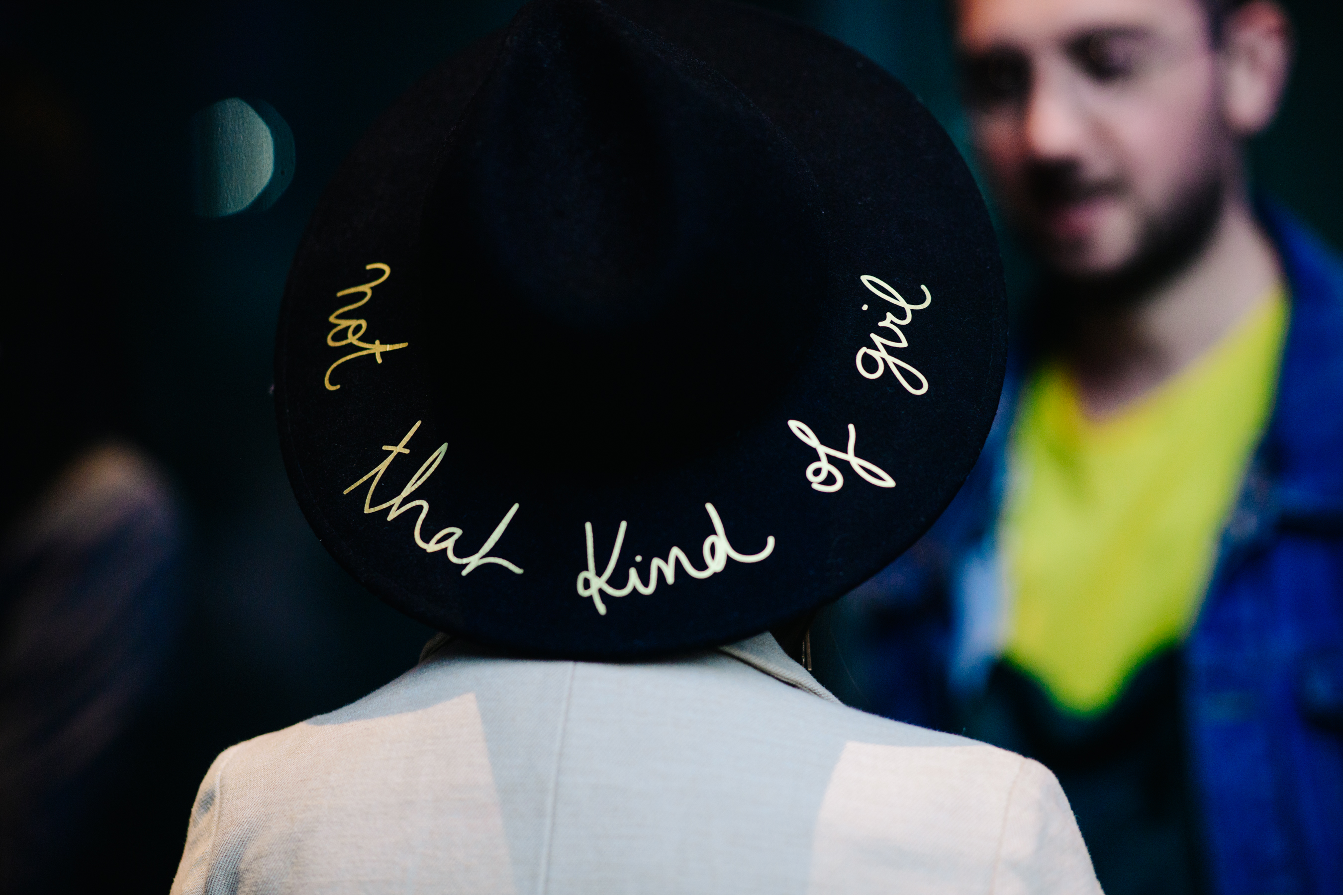 Woman wearing black hat