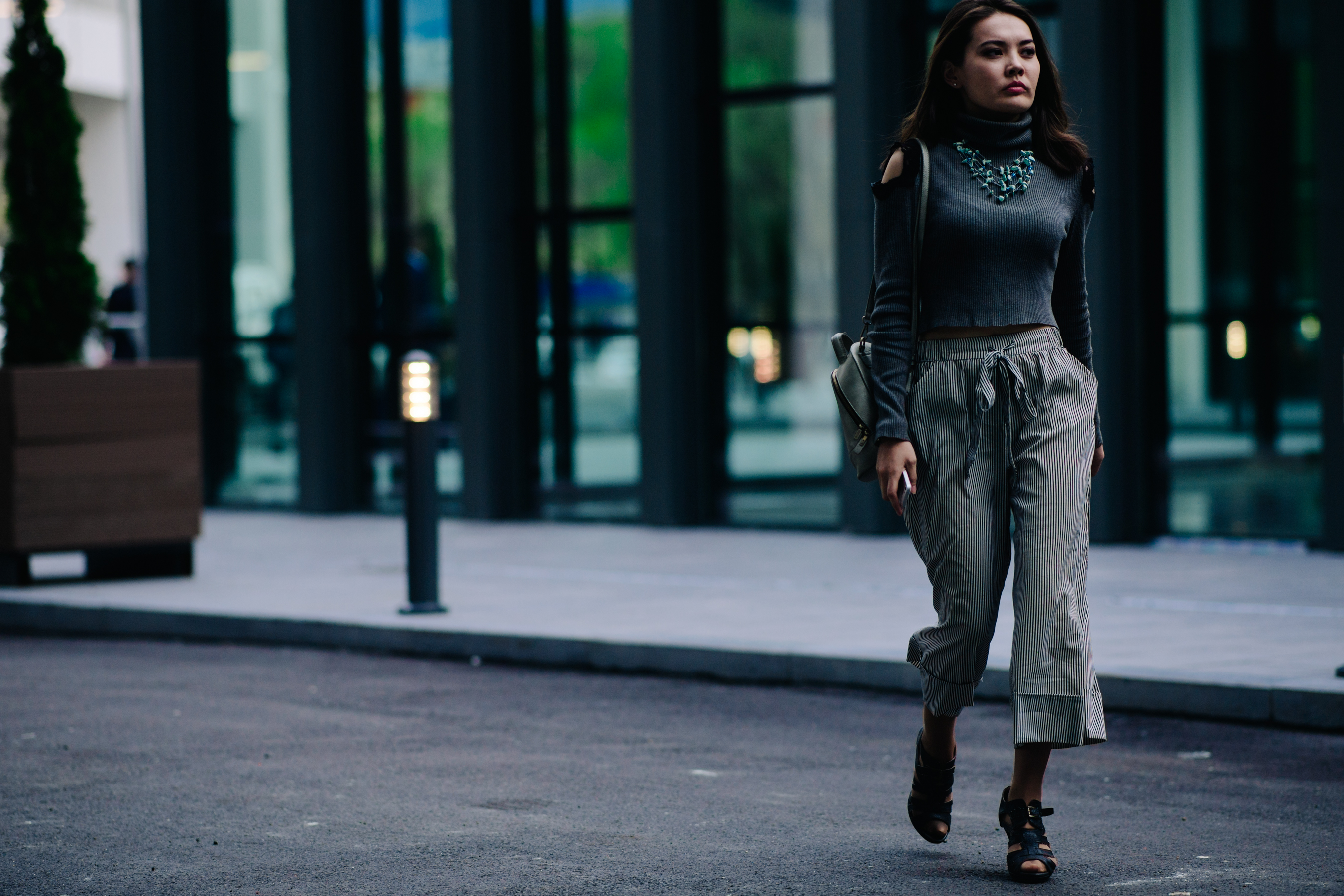 Woman wearing sweater and pants