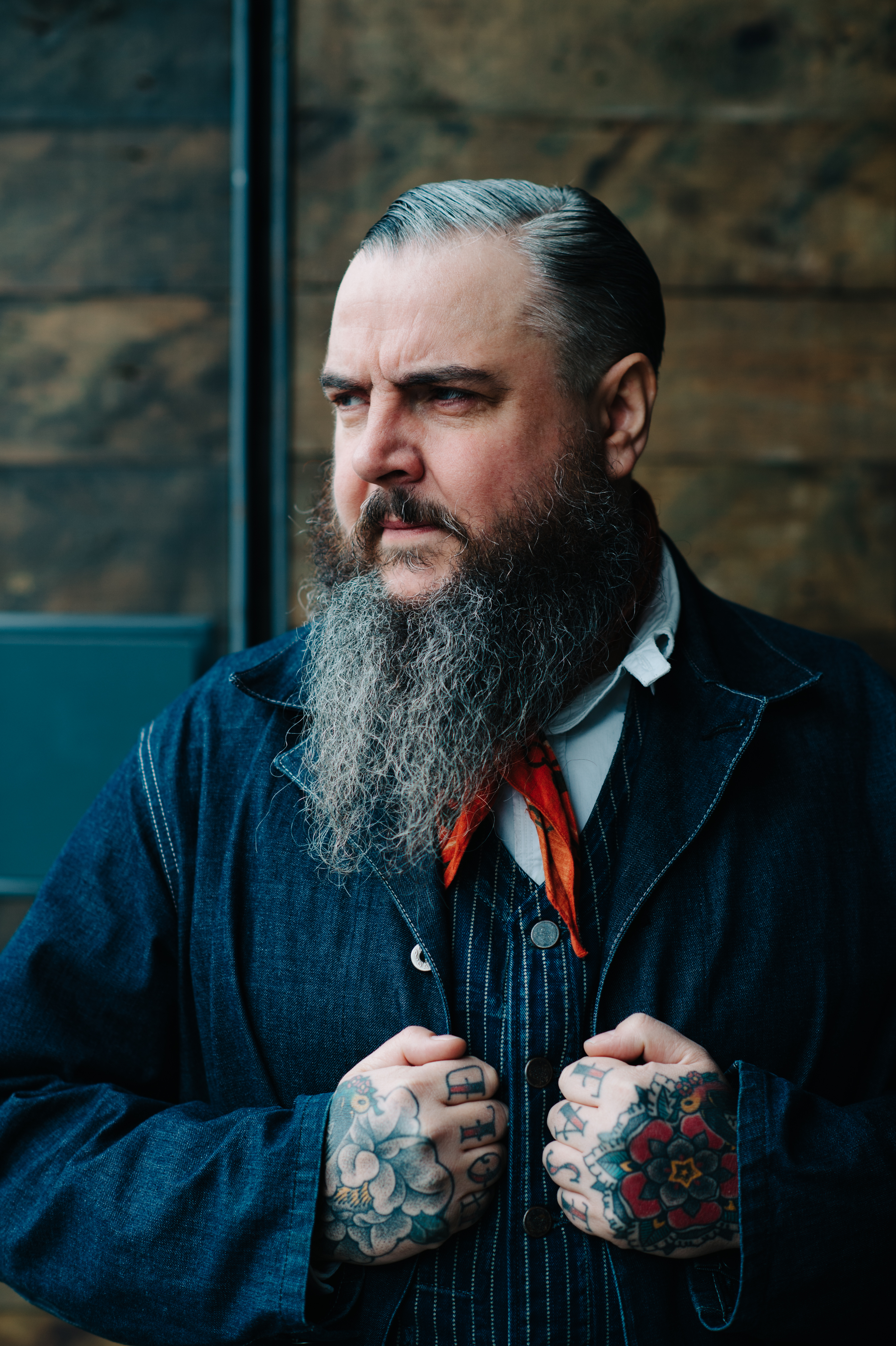 Man with tattooed hands