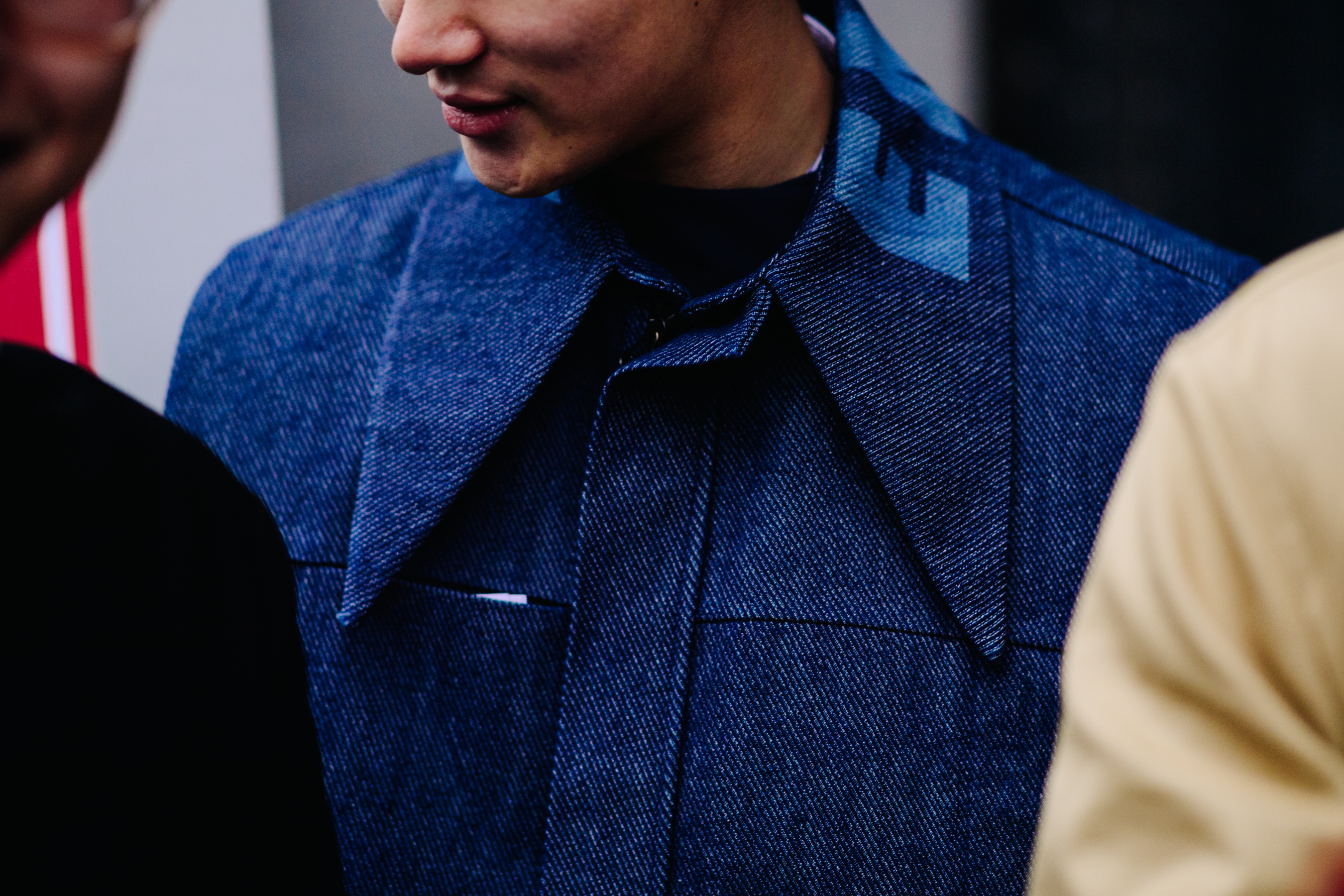 Man wearing blue denim shirt