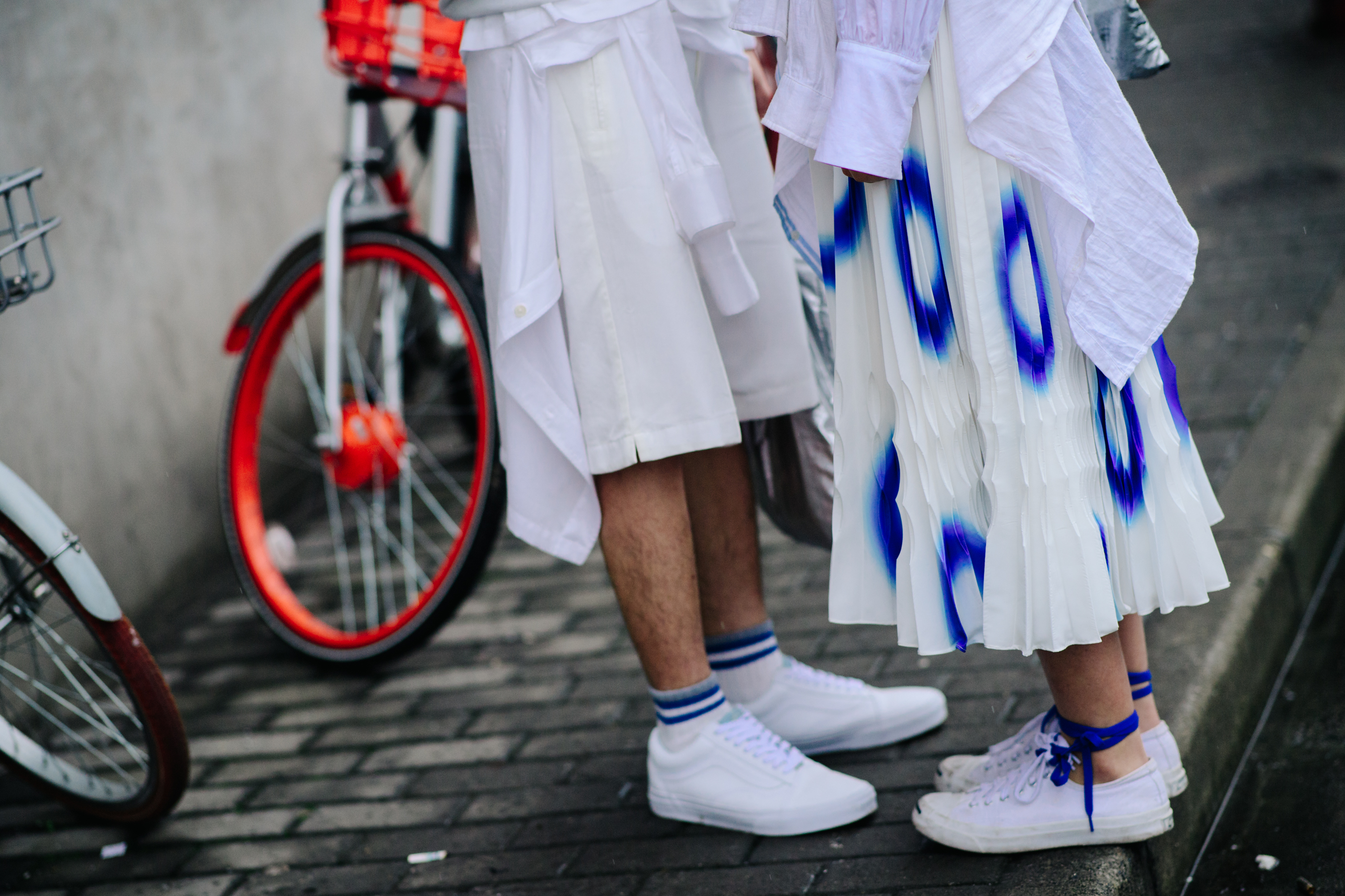 Man and woman wearing white