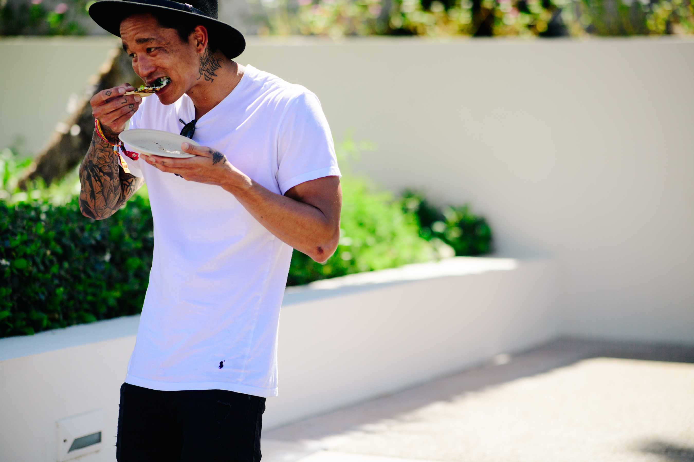 Man wearing white Ralph Lauren t-shirt