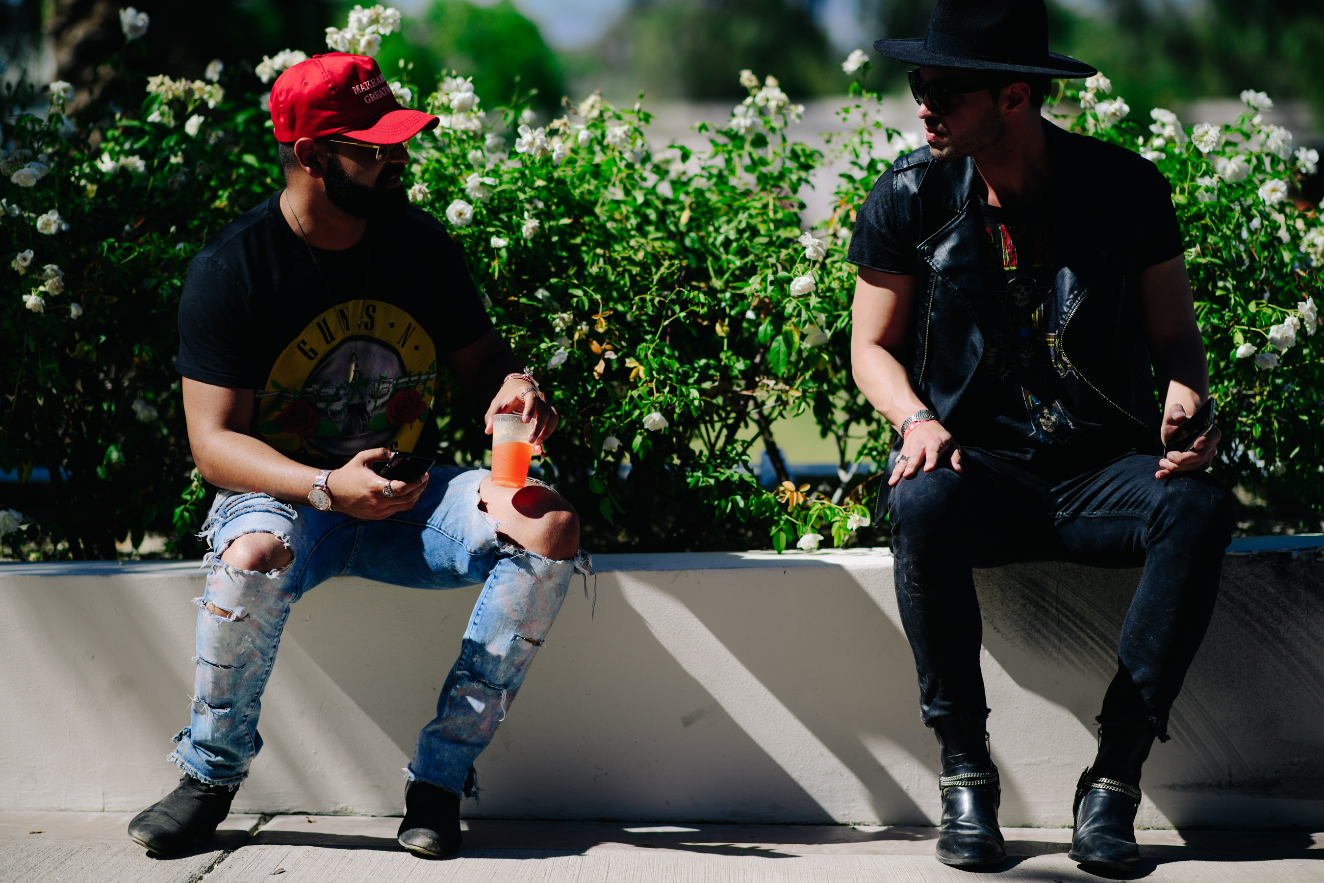 Two men wearing hats