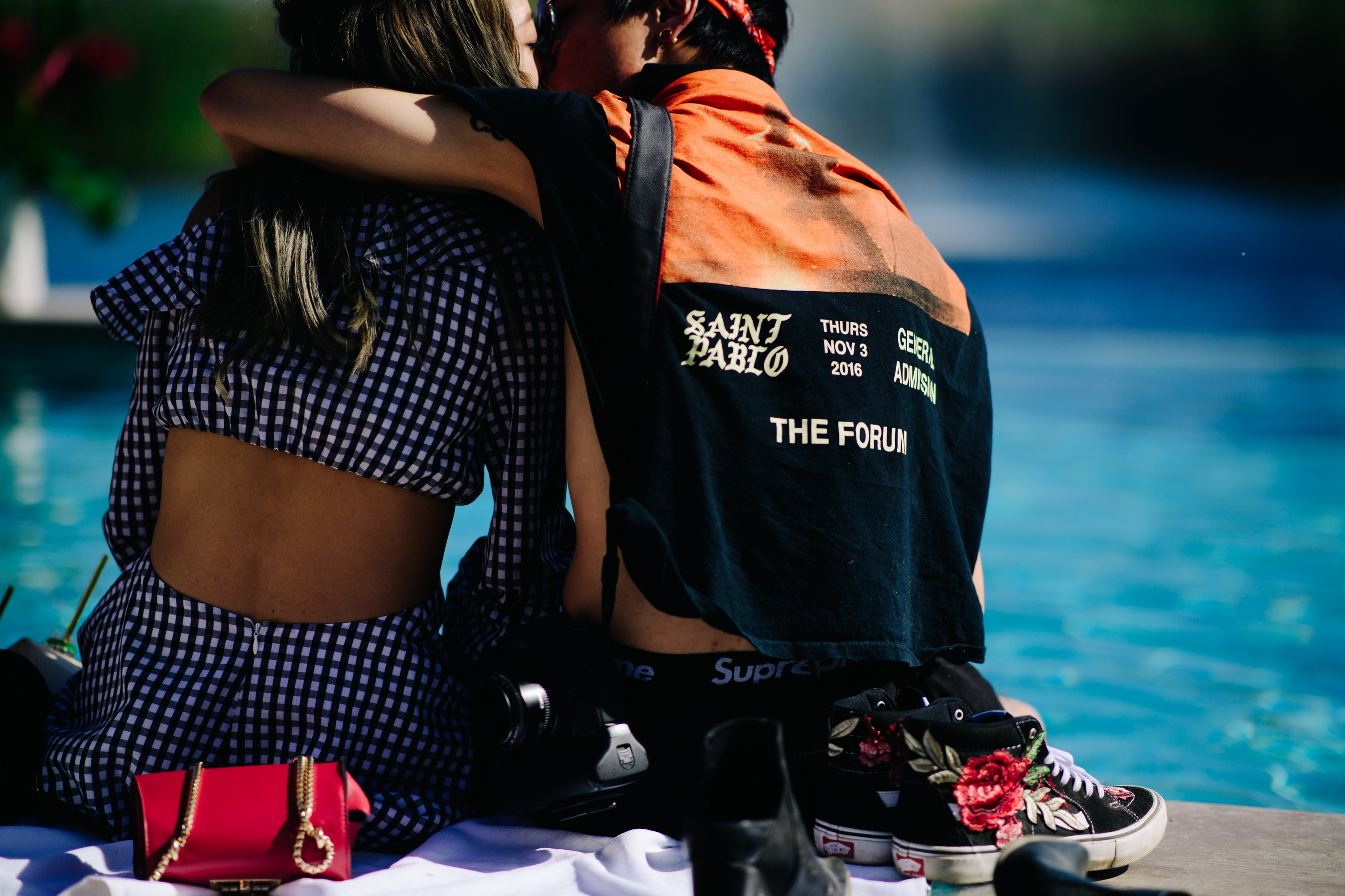 Couple kissing at the swimming pool
