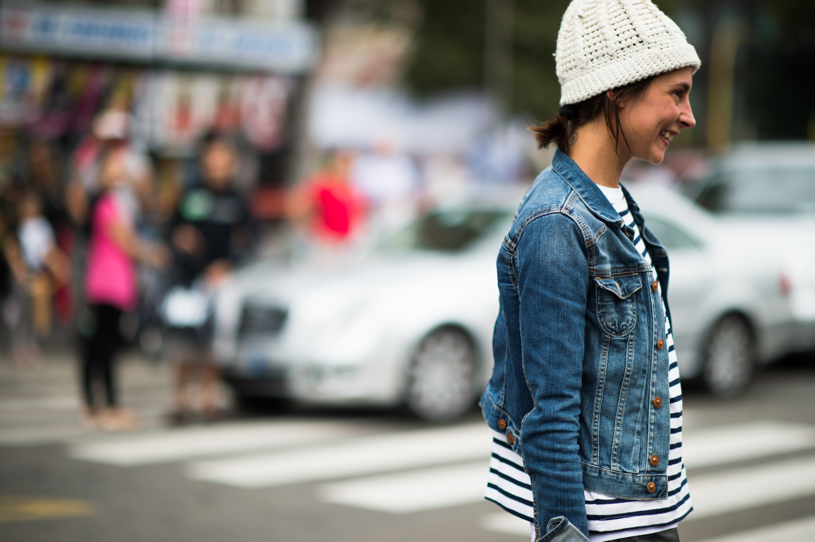 Woman wearing beanie and denim