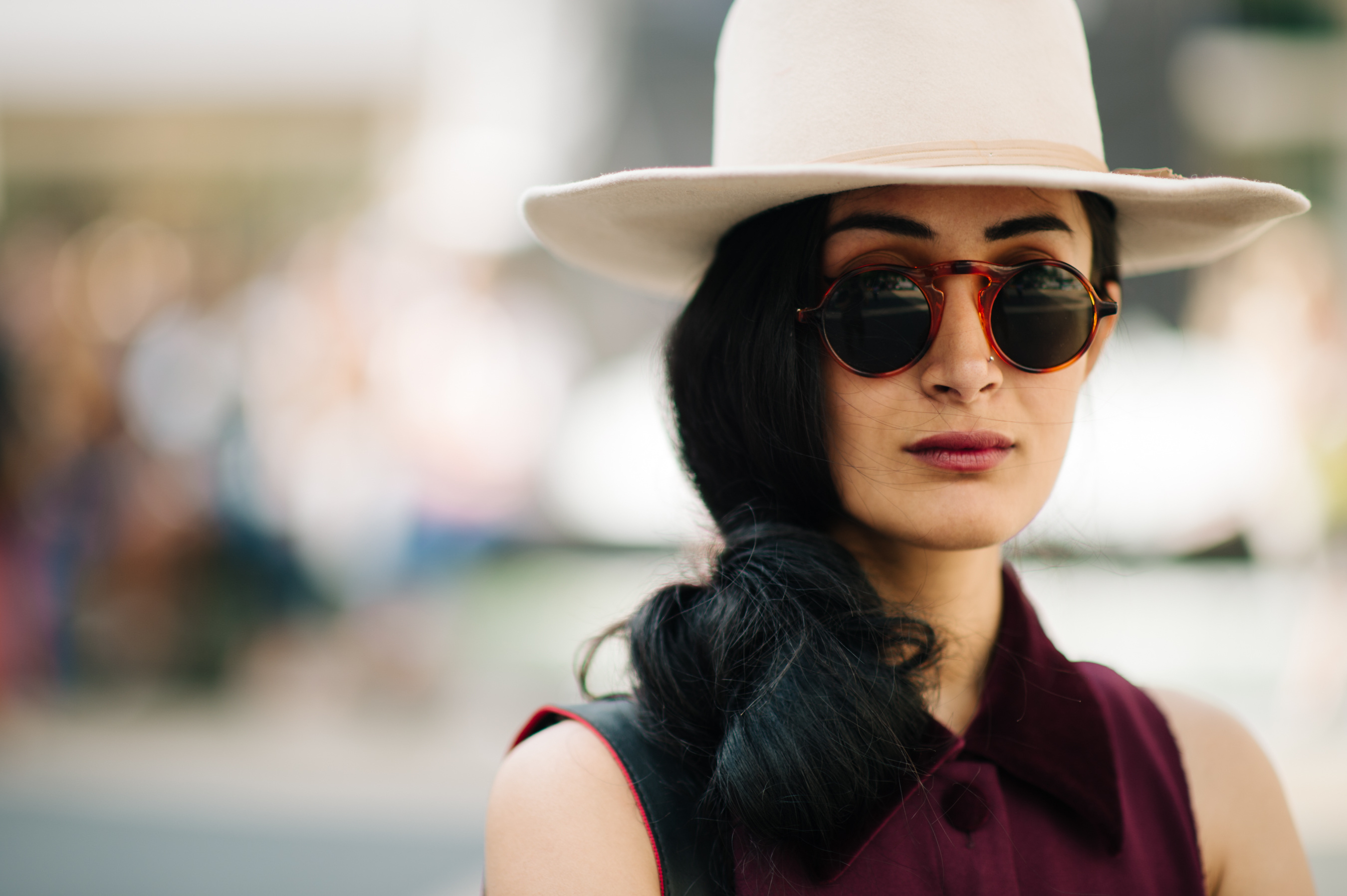 Portrait of a photographer wearing hat