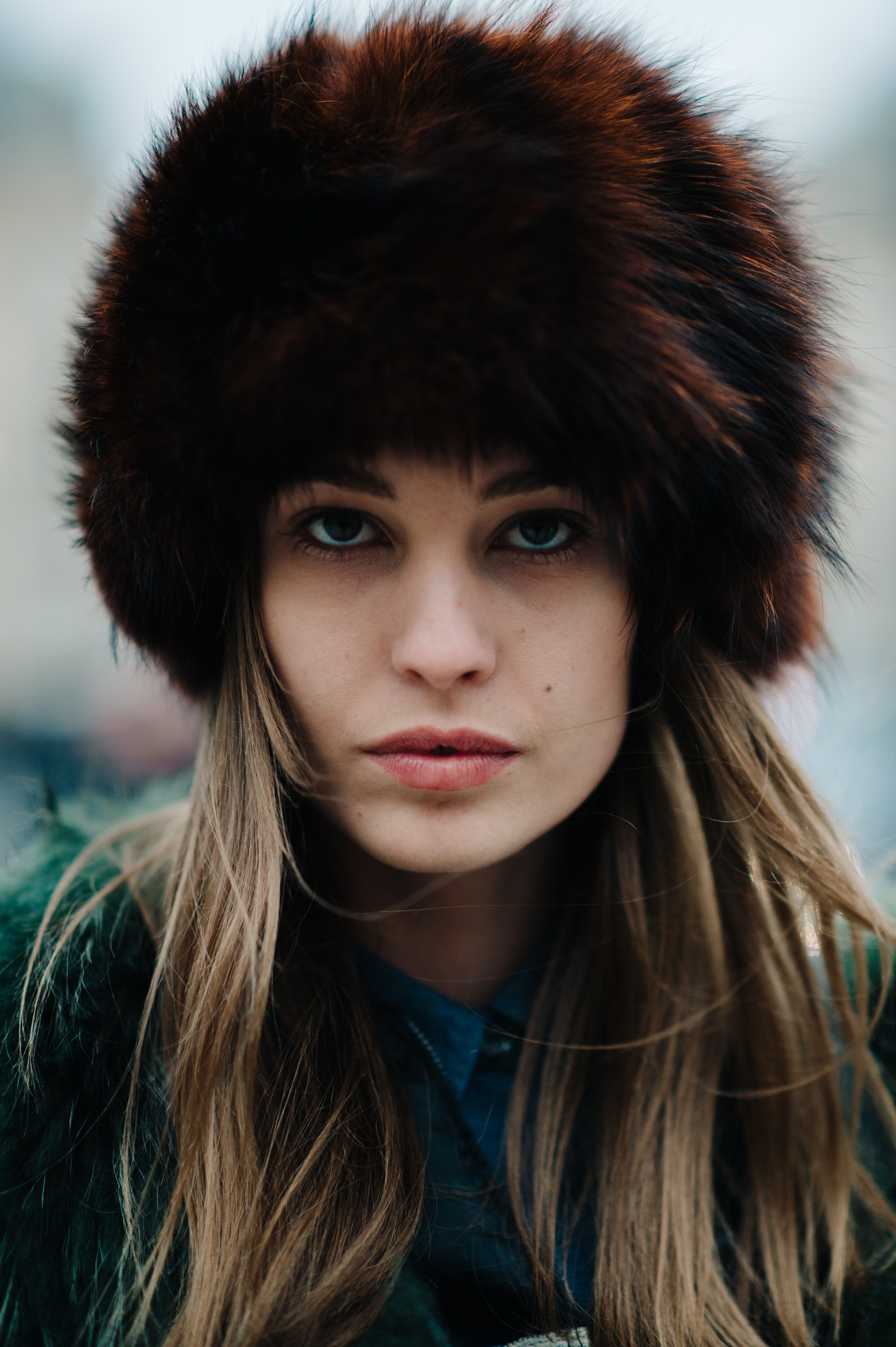 Portrait of a model wearing fur hat