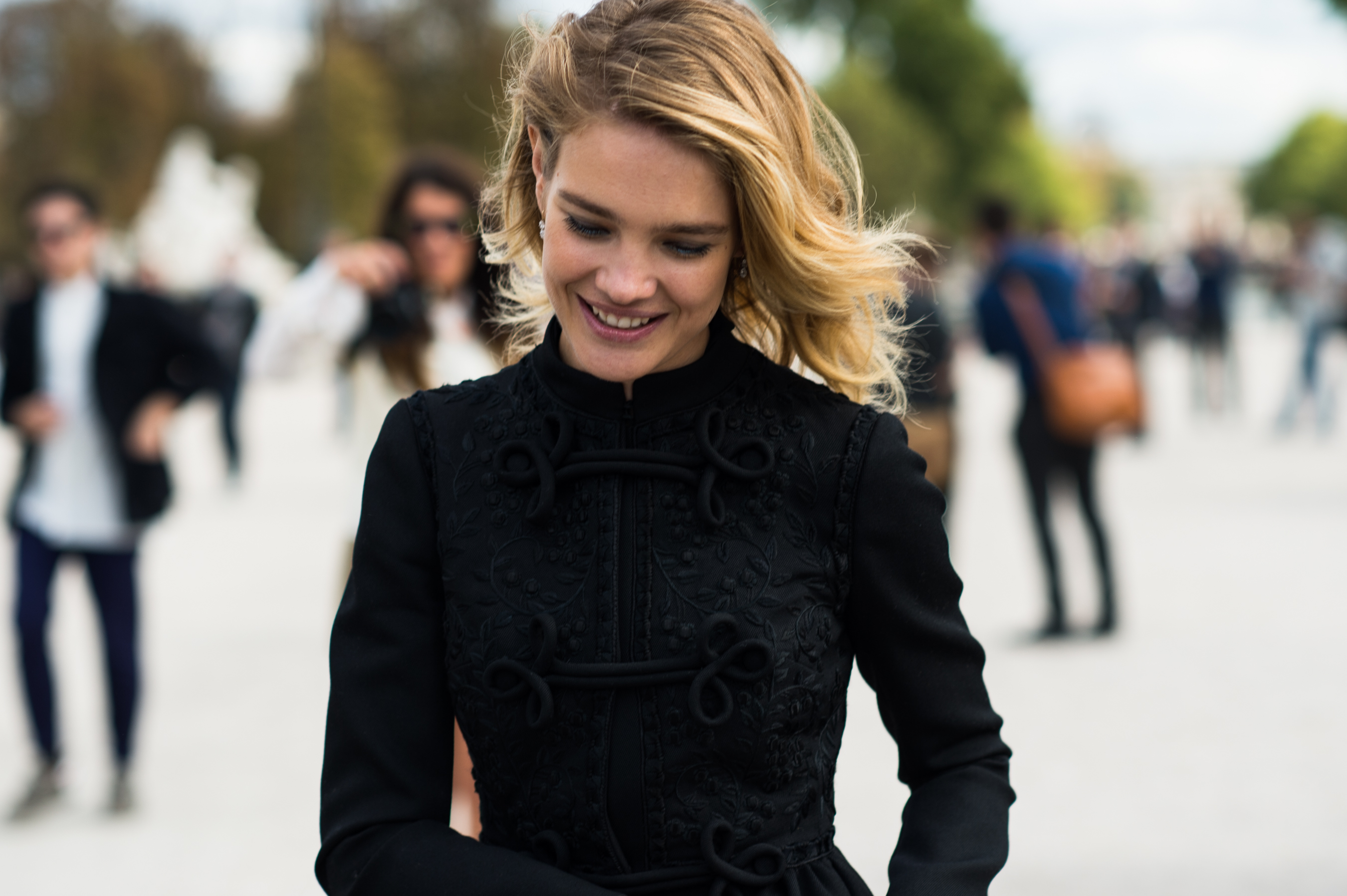 Russian woman wearing black coat
