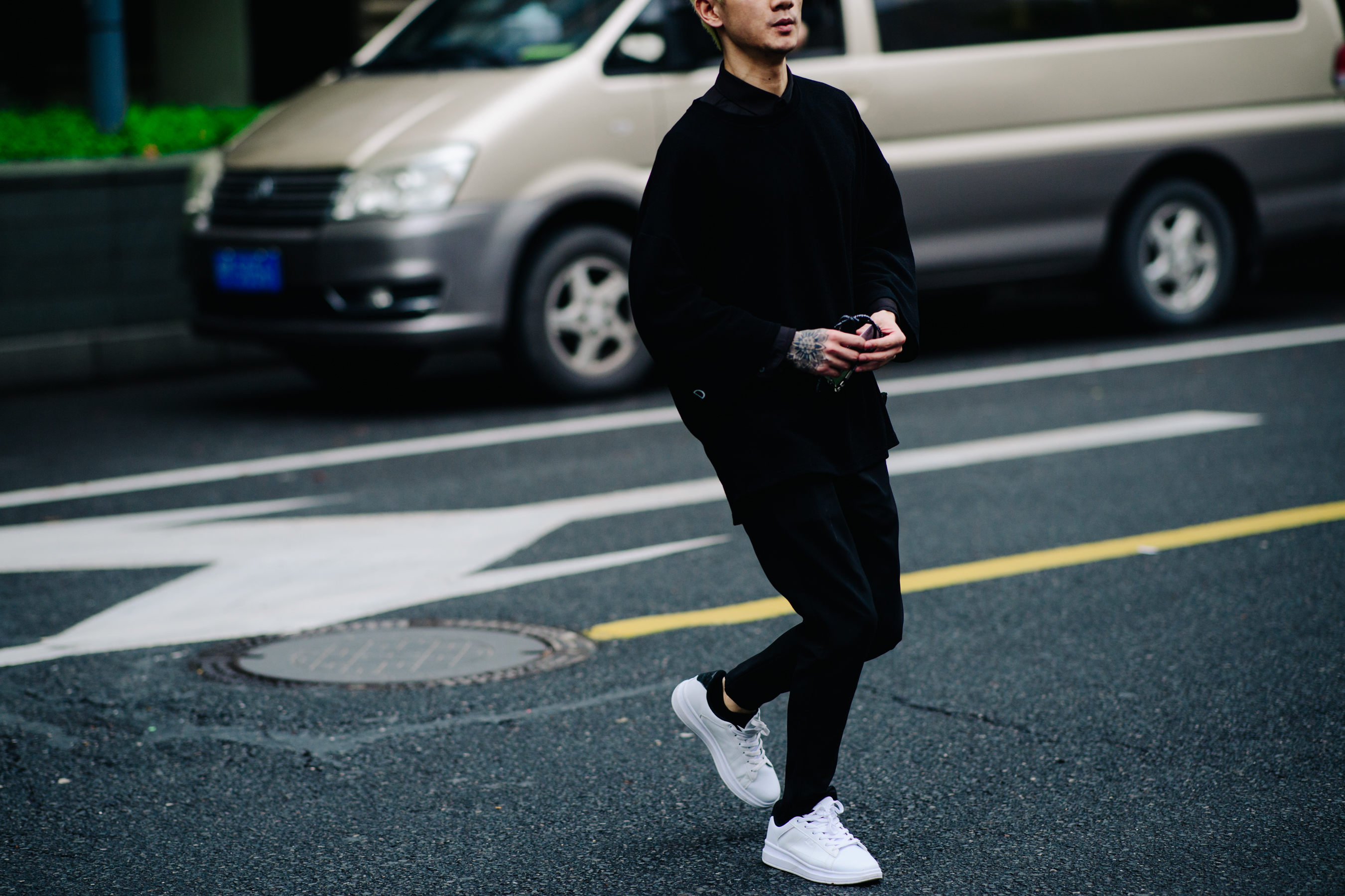 Man wearing Alexander McQueens sneakers