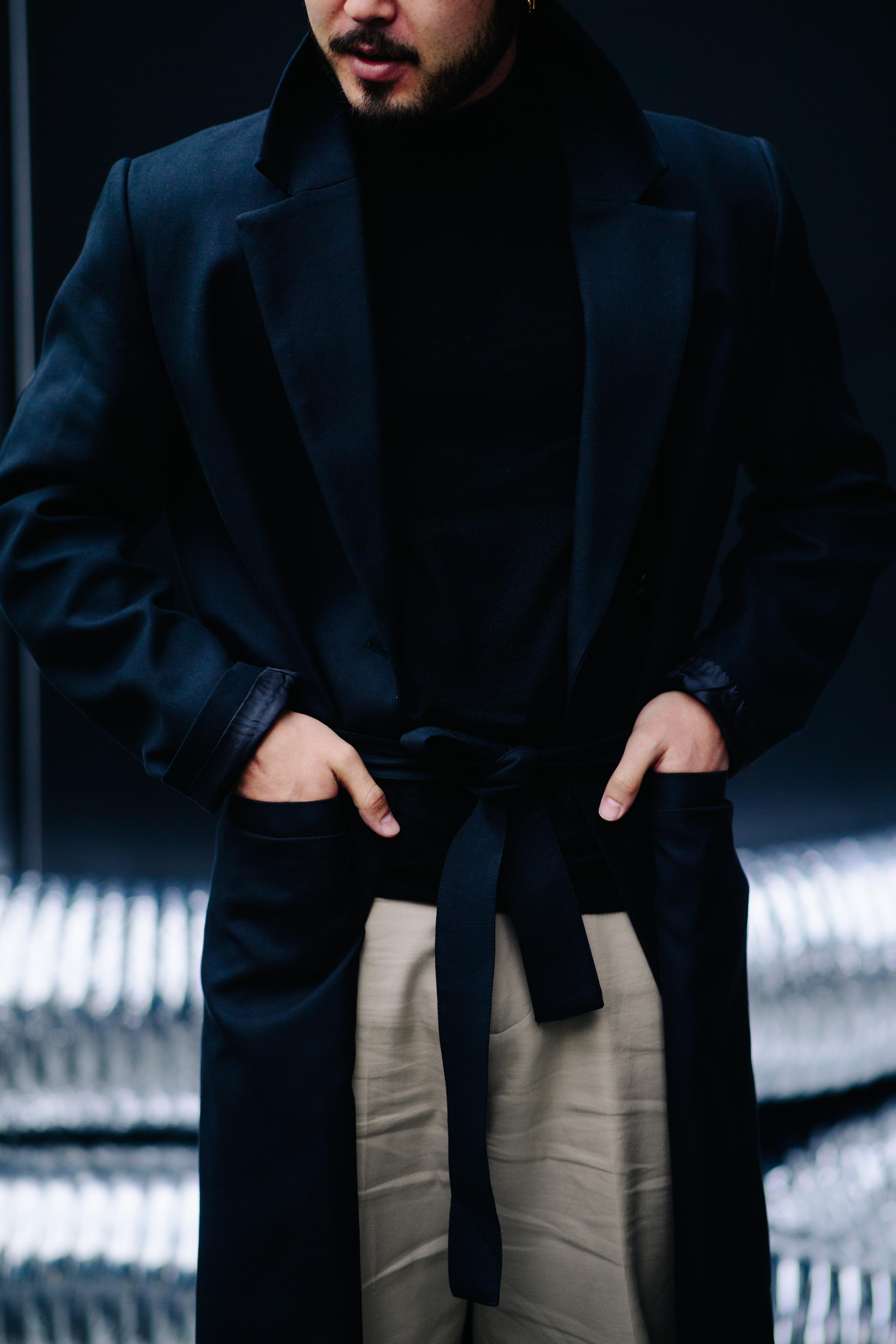 Kazakh photographer wearing black coat