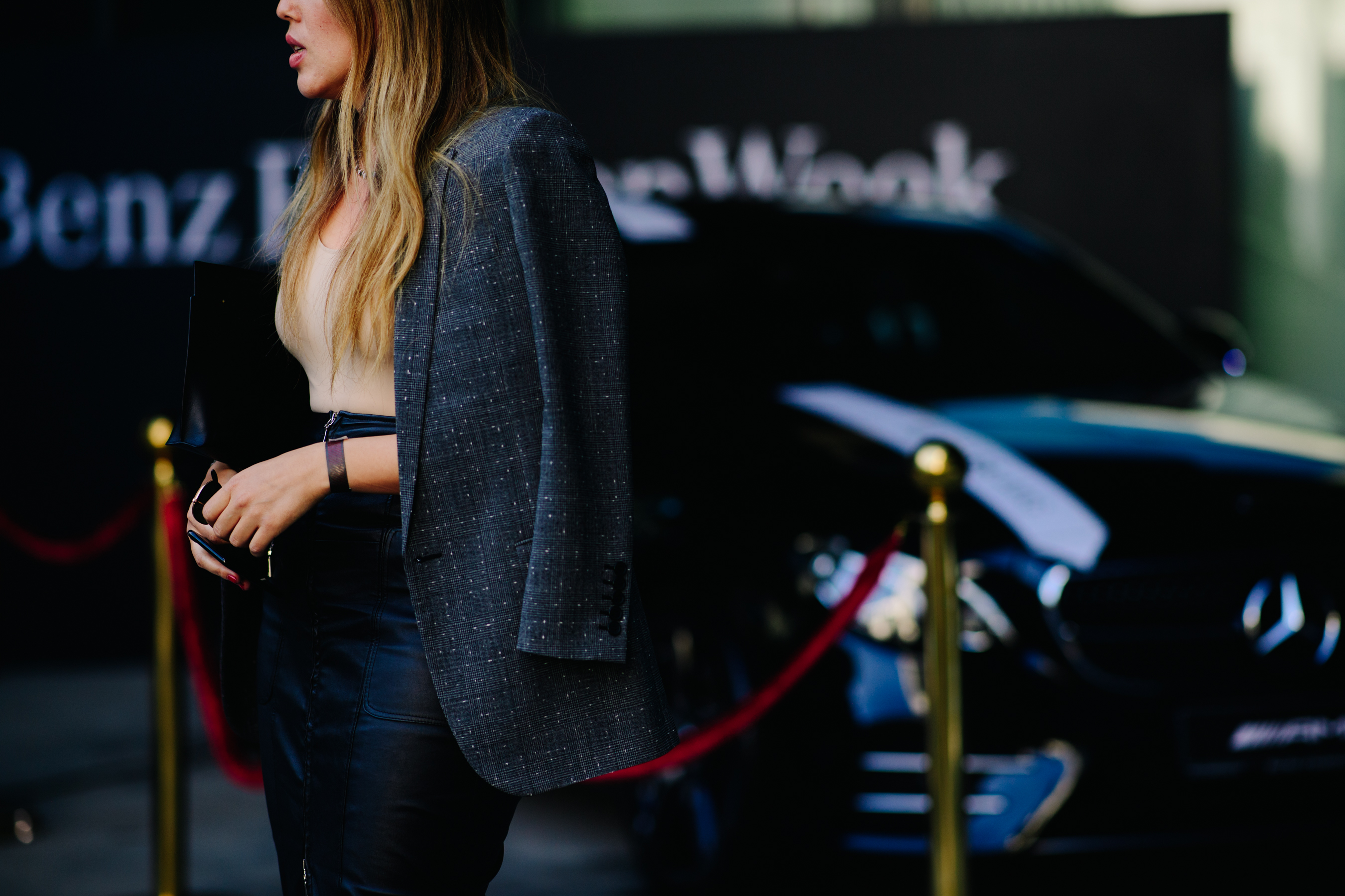 Woman wearing gray blazer